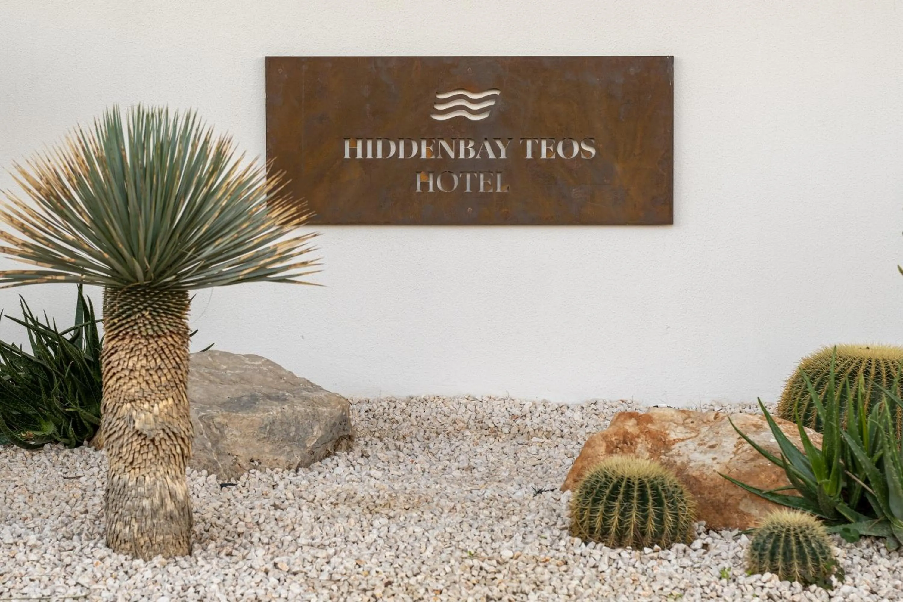 Property logo or sign in Hiddenbay Teos Hotel