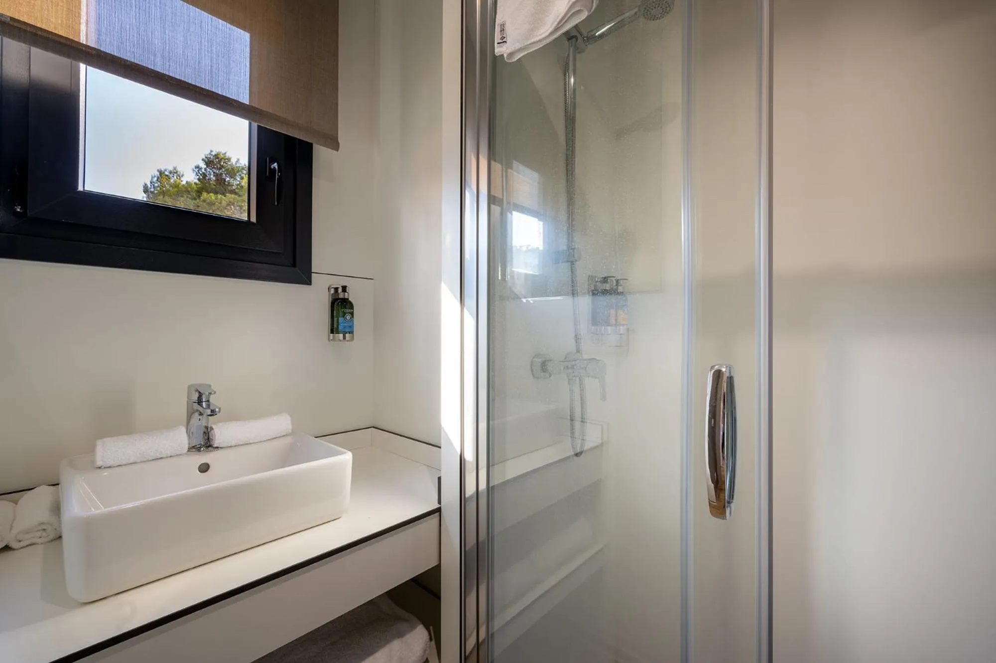 Bathroom in Talaia Plaza EcoResort Begur