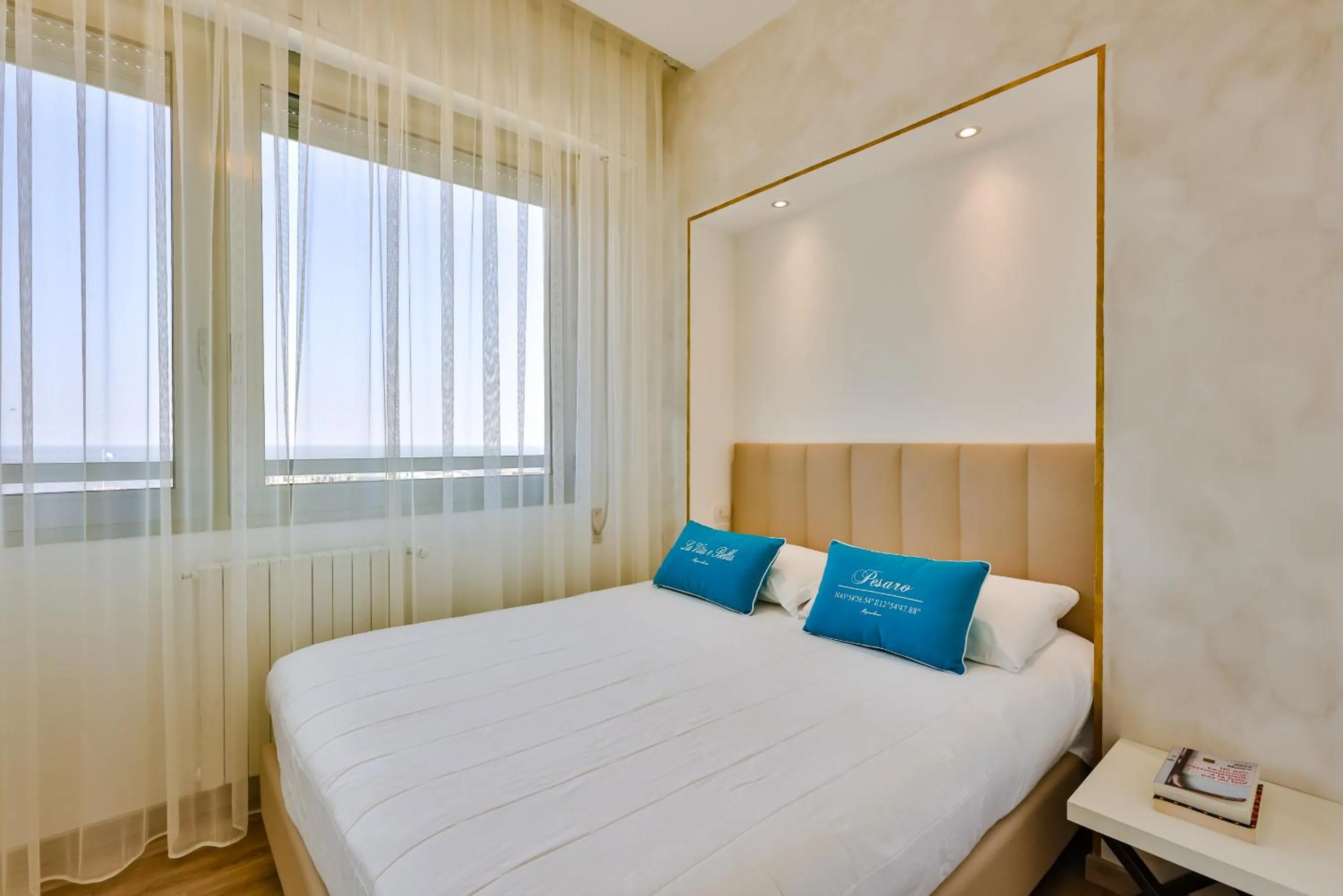 Bed in UNAHOTELS Imperial Sport Hotel