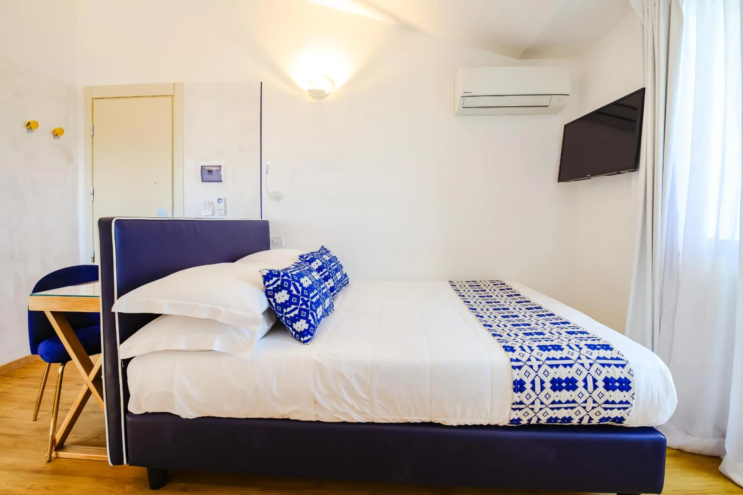 Bed in UNAHOTELS Imperial Sport Hotel