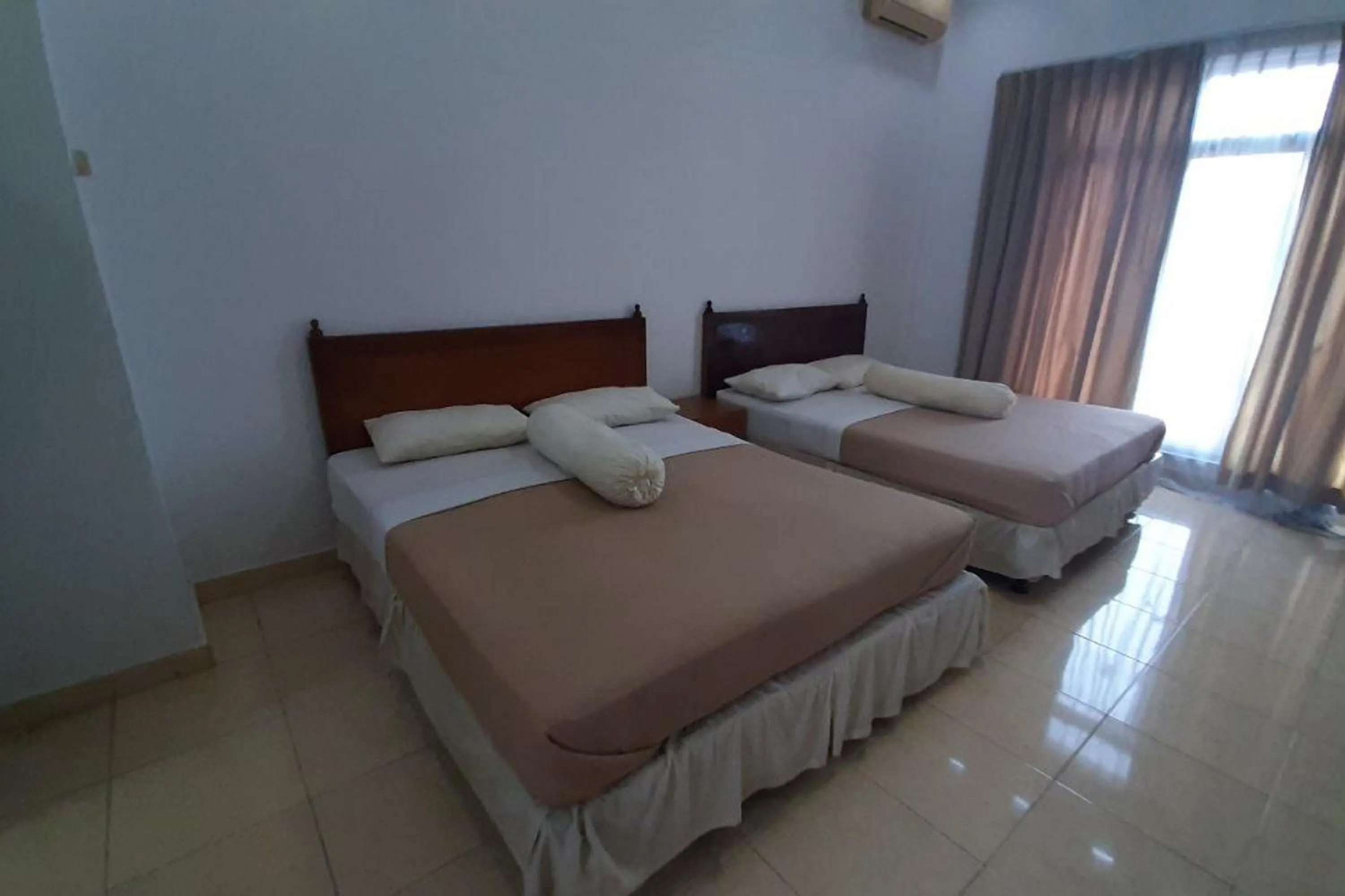 Bed in Hotel Akbar Banyumas RedPartner