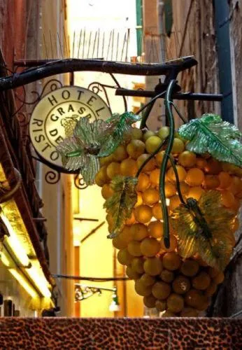 Property logo or sign in Hotel al Graspo de Ua