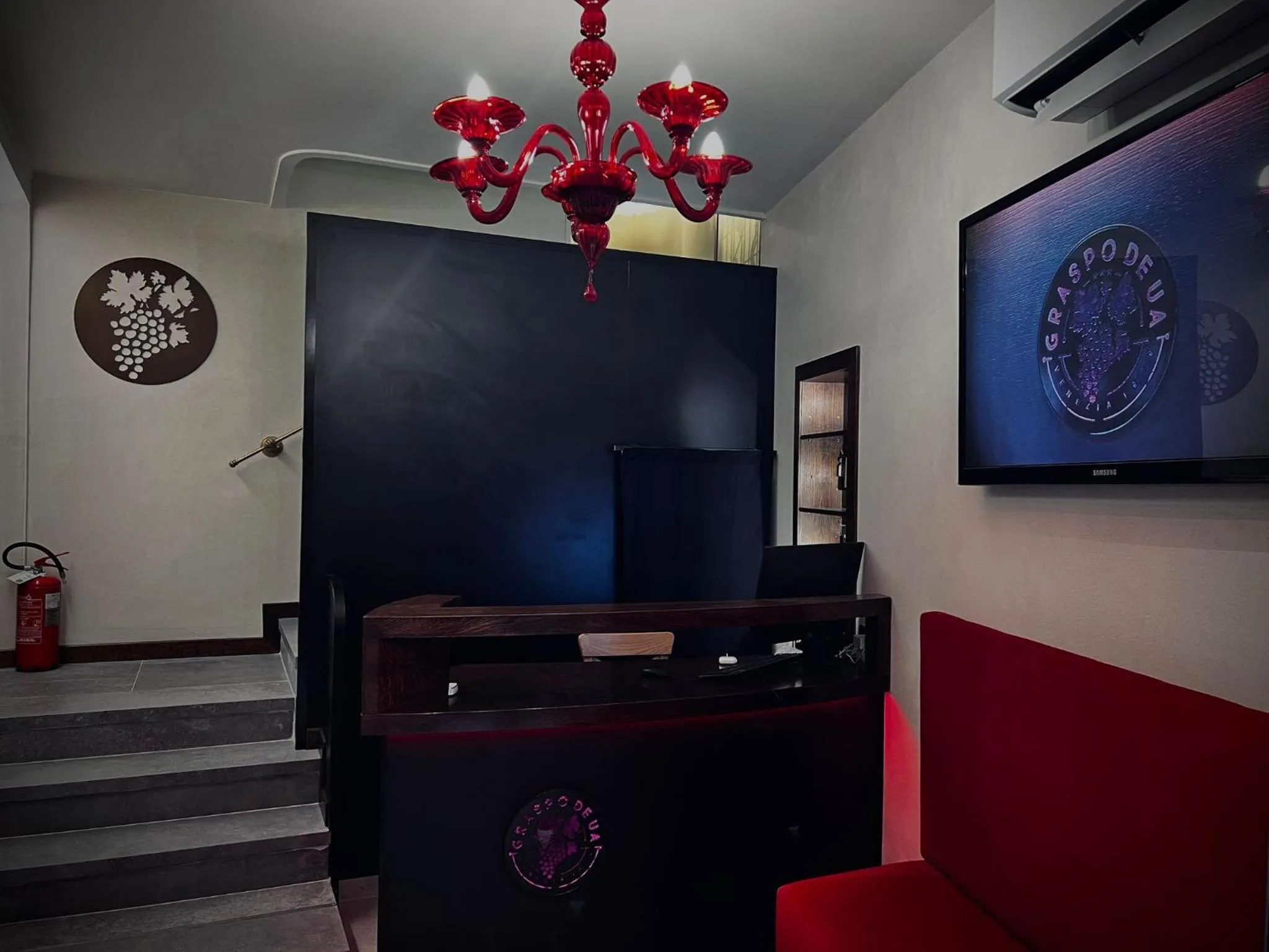 Communal lounge/ TV room in Hotel al Graspo de Ua