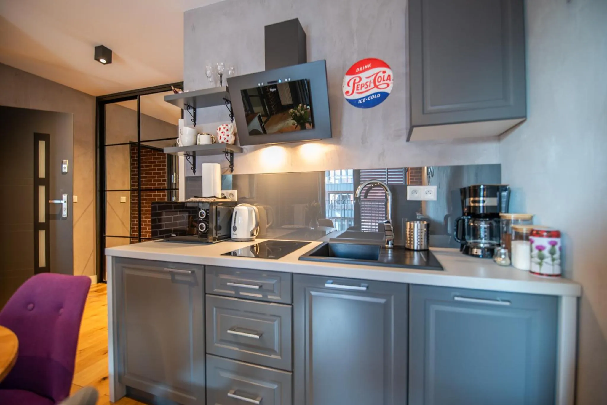 Kitchen or kitchenette in City Lights Kazimierz