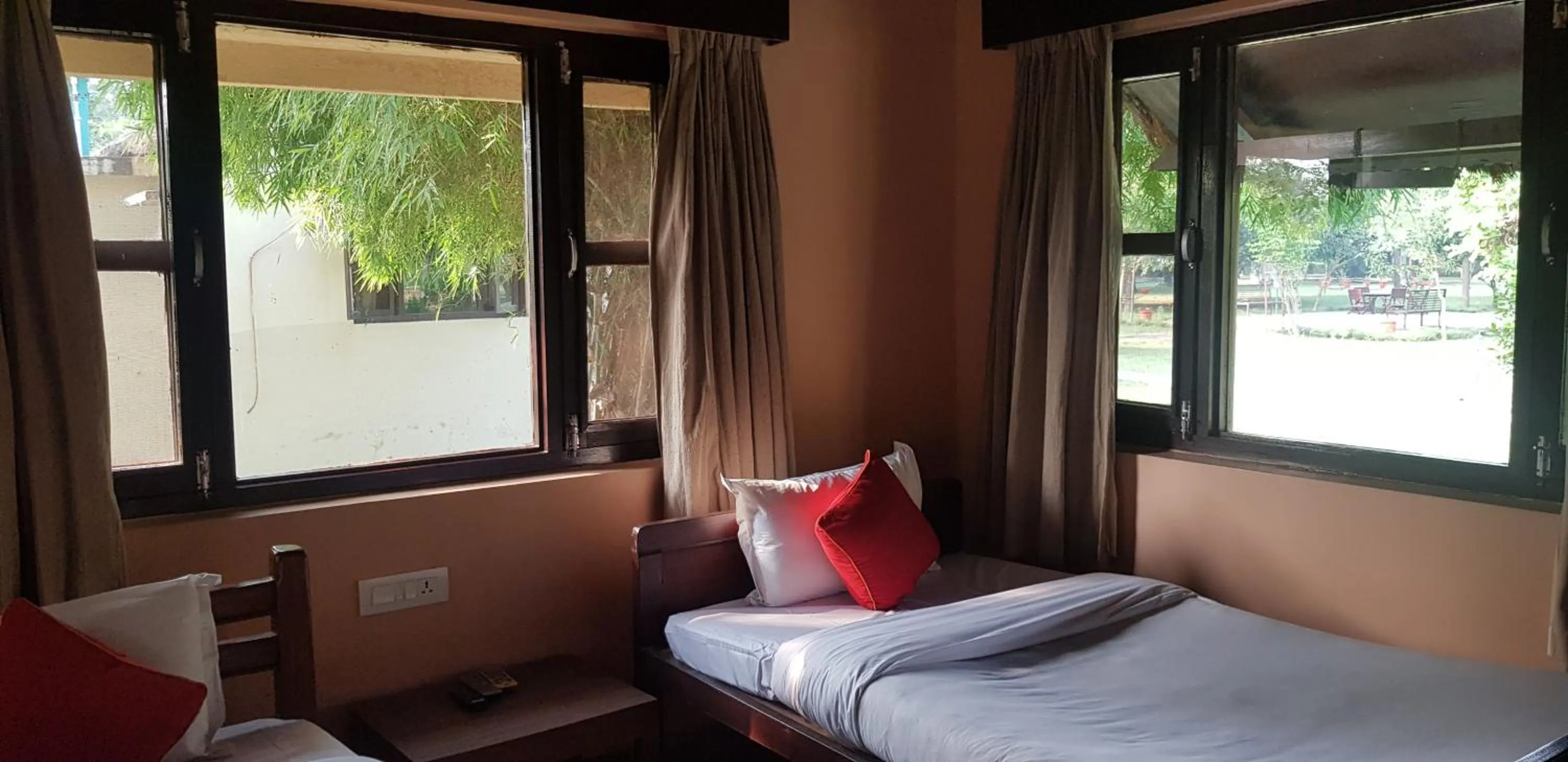 Bed in Lumbini Buddha Garden Resort