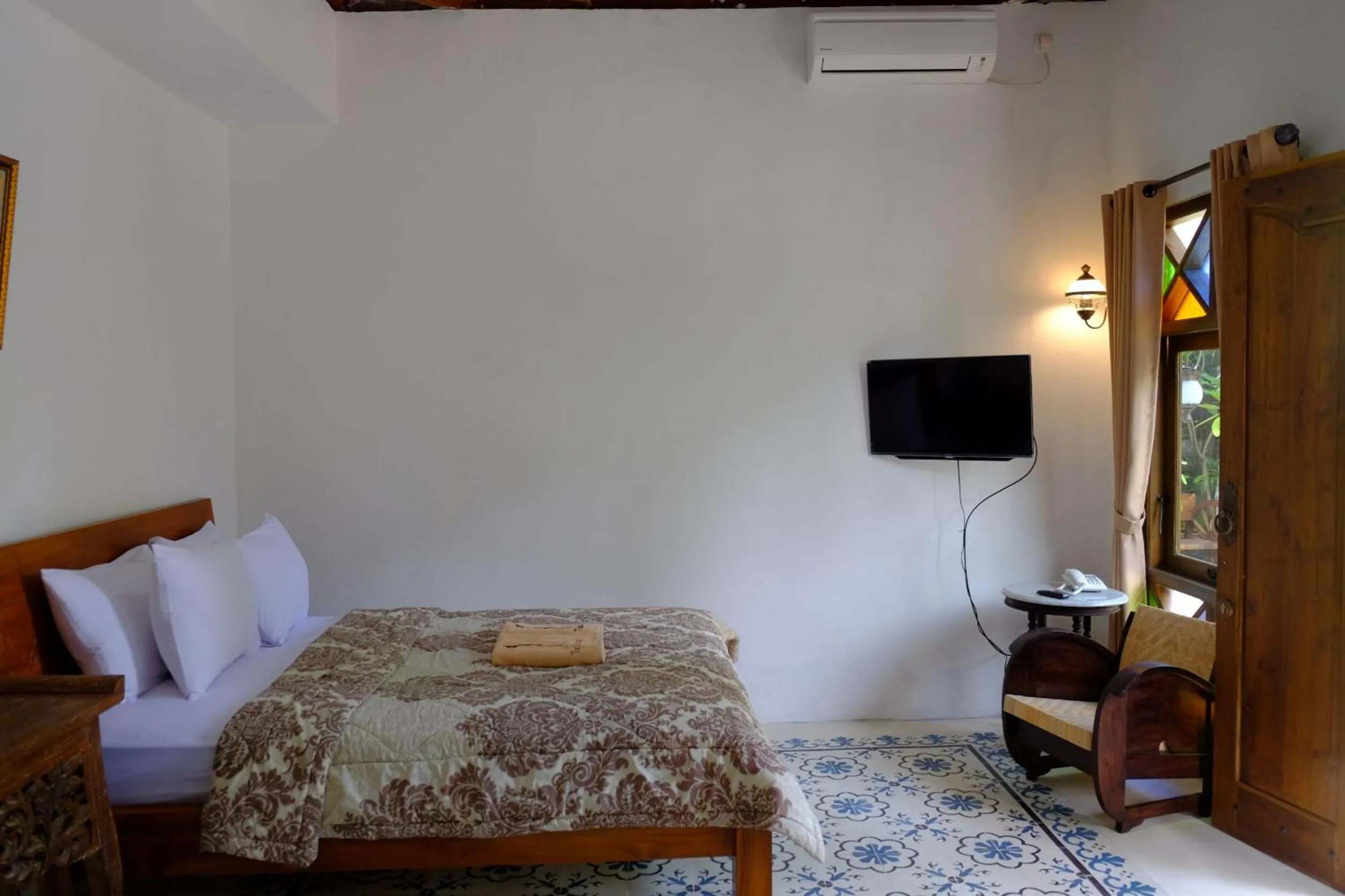 Bed in The Satu Stay Kayen