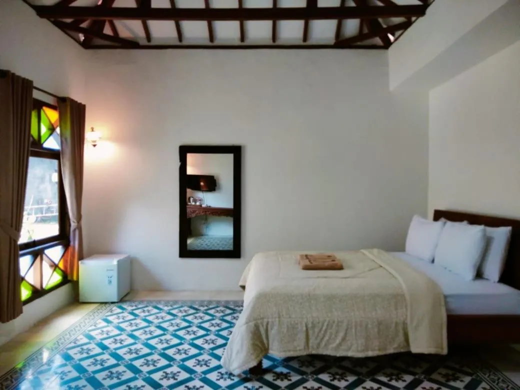 Bed in The Satu Stay Kayen