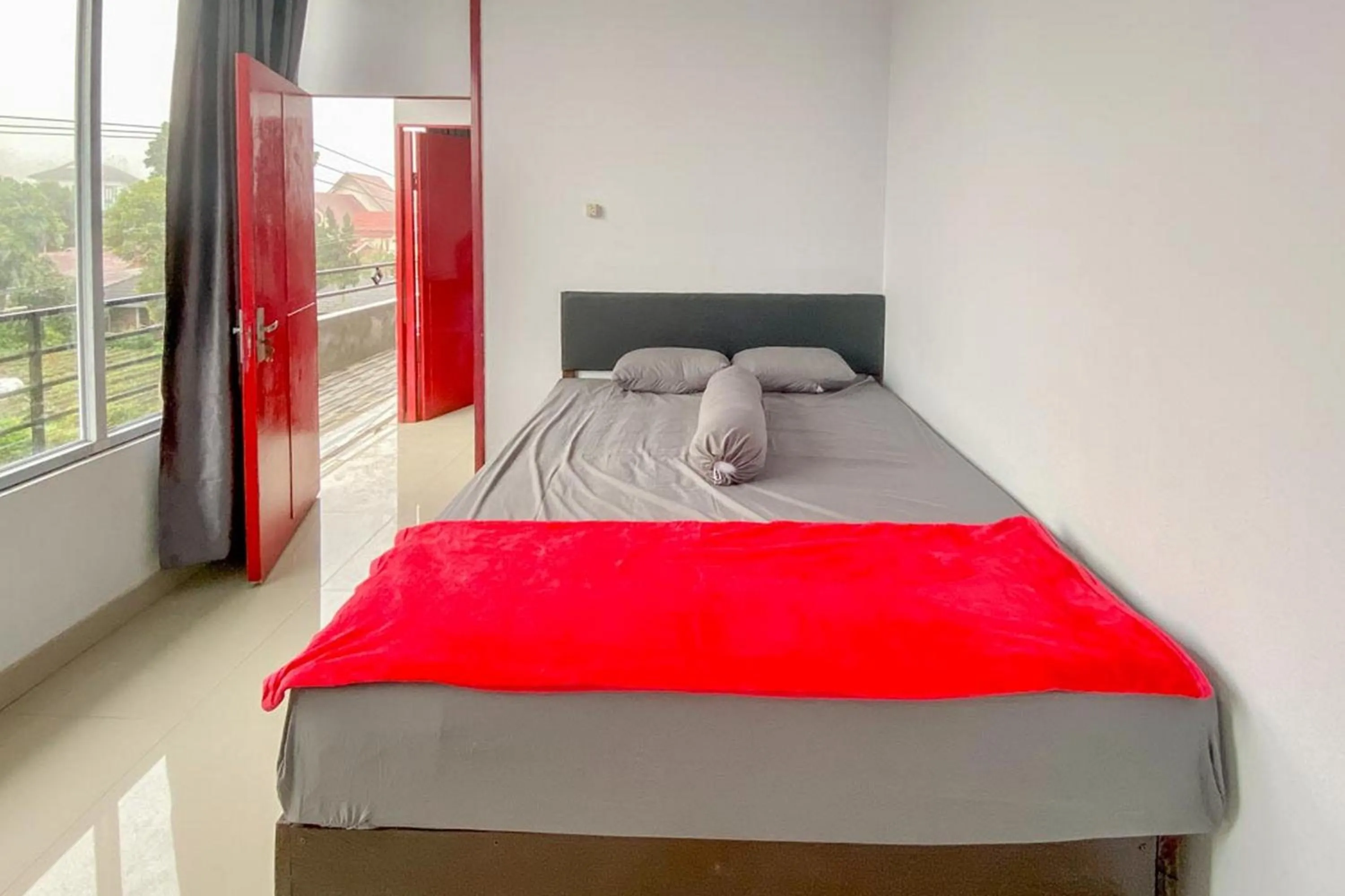 Bed in Sky Residence Tomohon Mitra RedDoorz