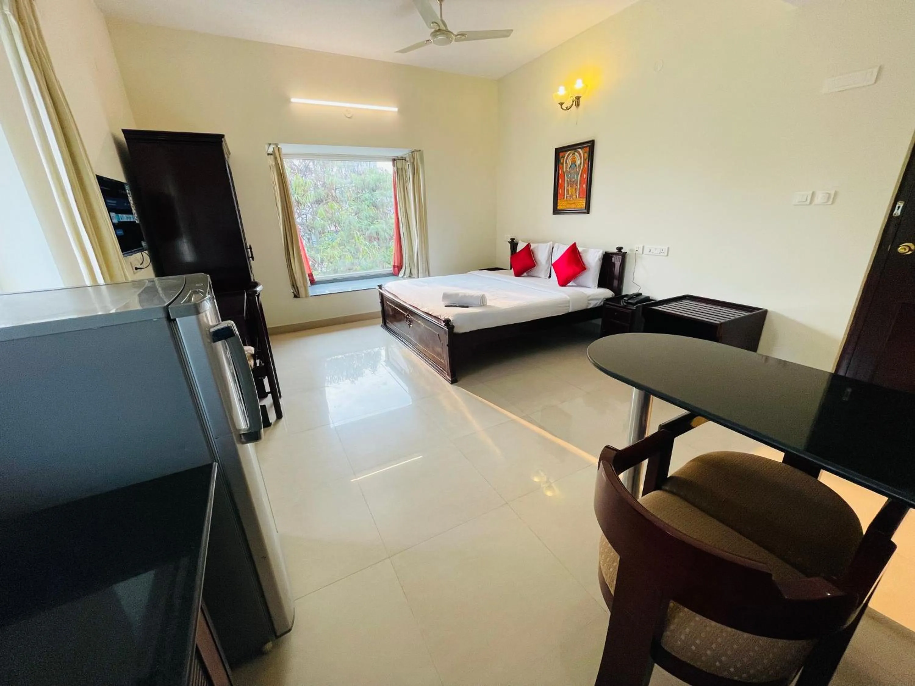Photo of the whole room, Bed in Sanctum Suites Indiranagar Bangalore