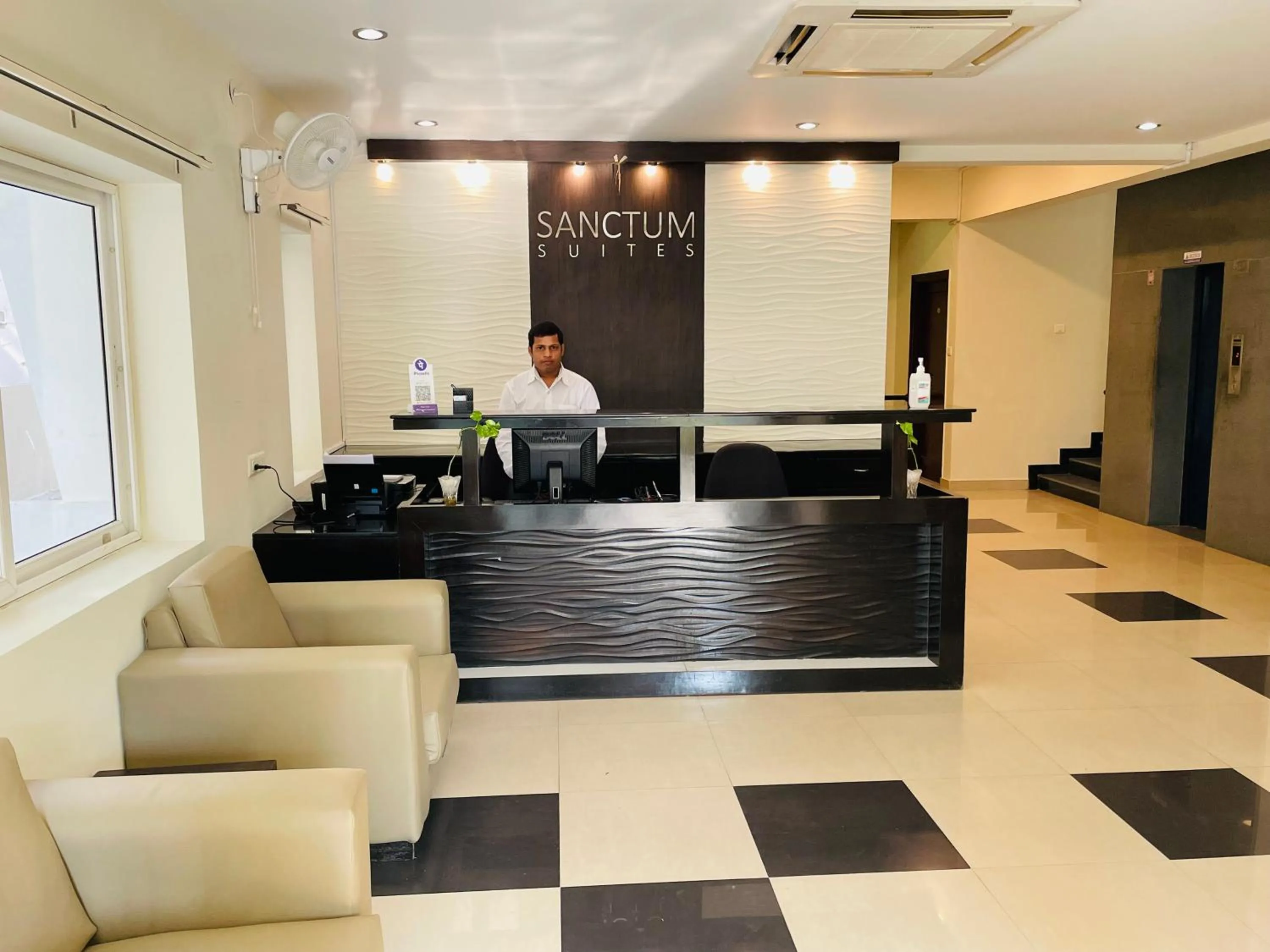 Staff in Sanctum Suites Indiranagar Bangalore