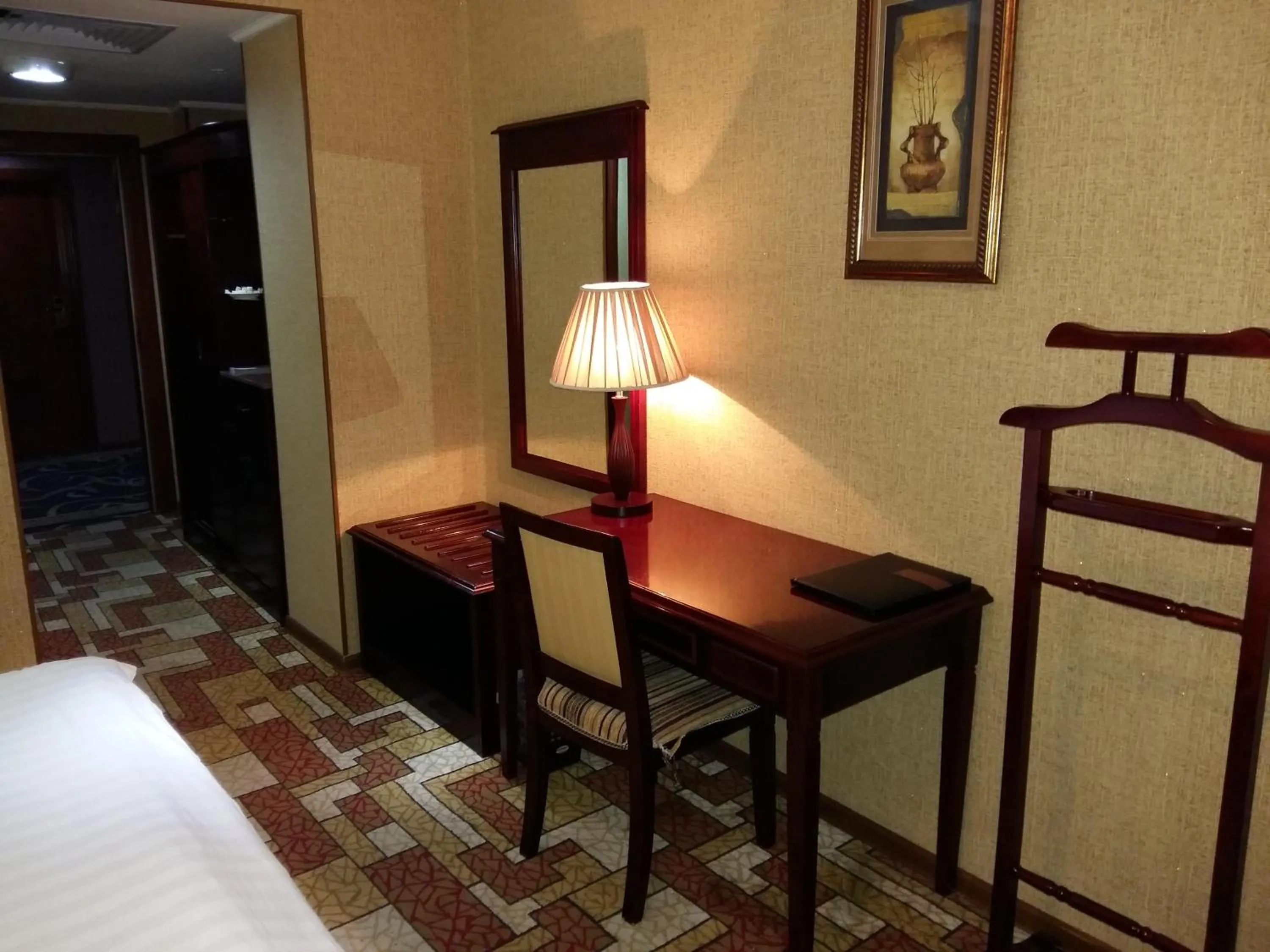 Bed in Asia Grand Hotel