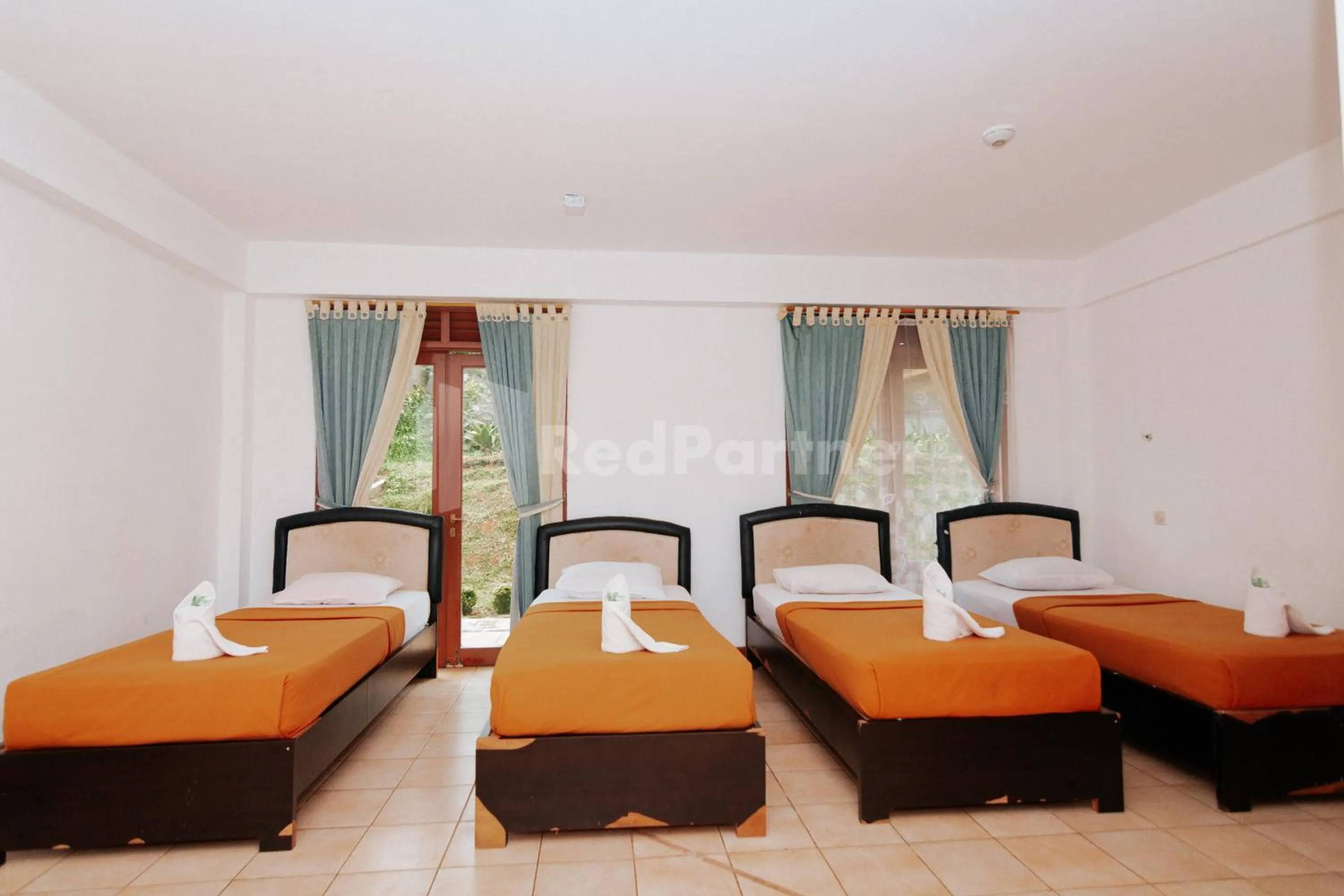 Photo of the whole room, Bed in Villa Green Valley Puncak RedPartner