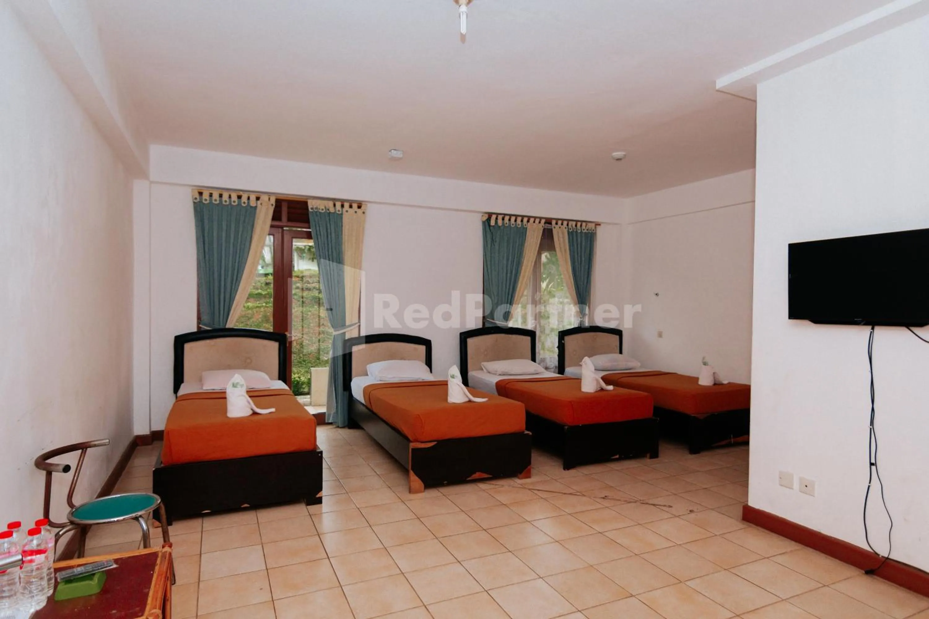 Photo of the whole room, Bed in Villa Green Valley Puncak RedPartner