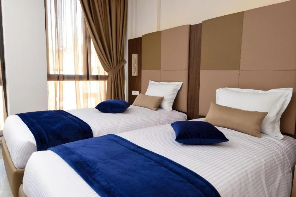 Bed in Hôtel Lescure Business and SPA