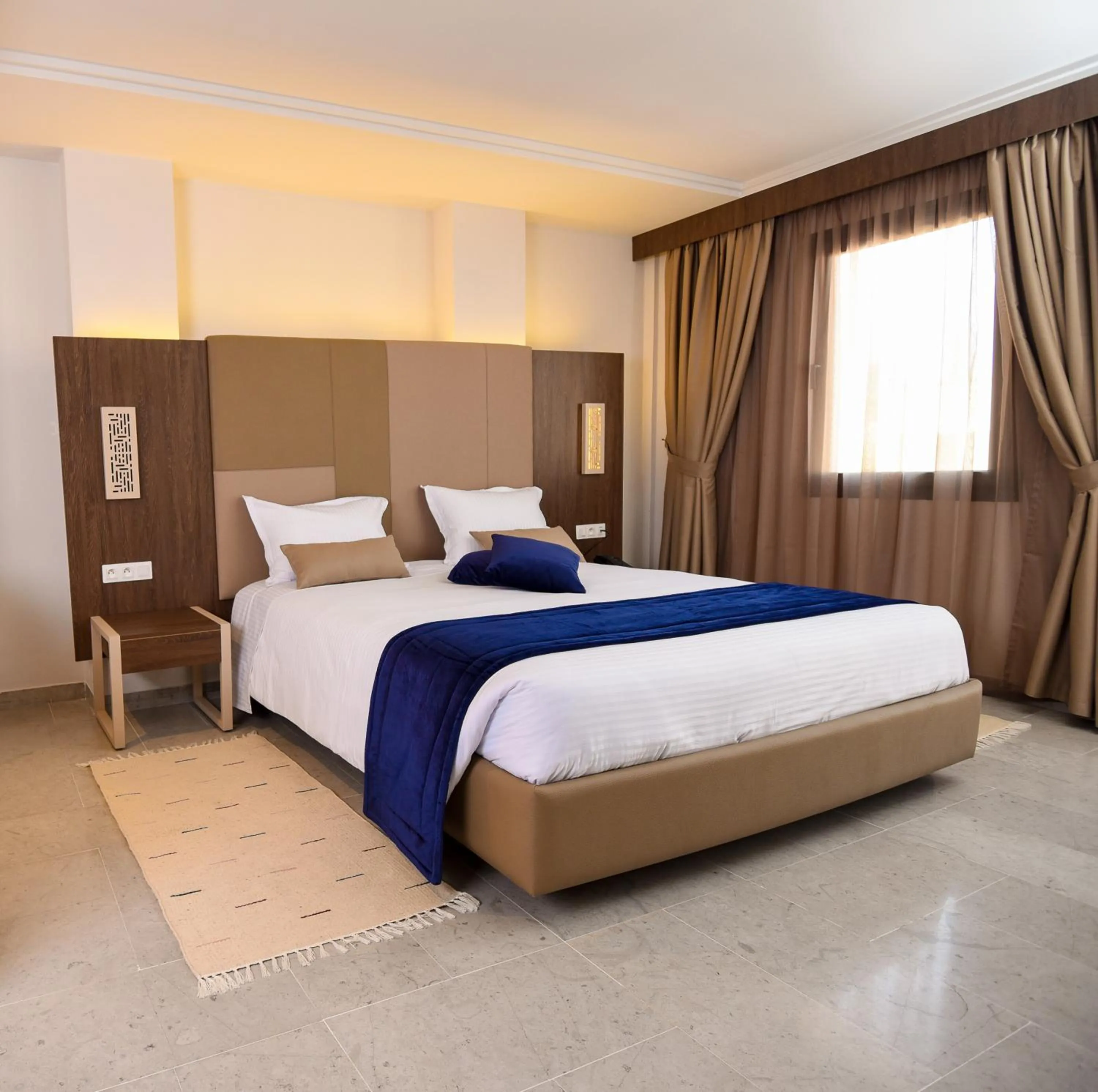 Bed in Hôtel Lescure Business and SPA