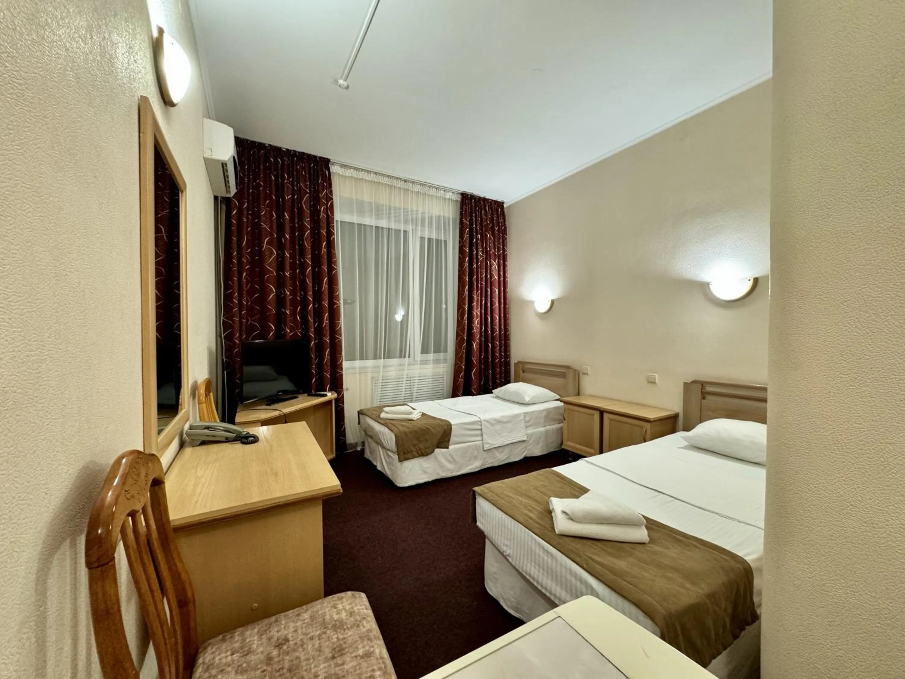 Bed in Hotel Zhambyl