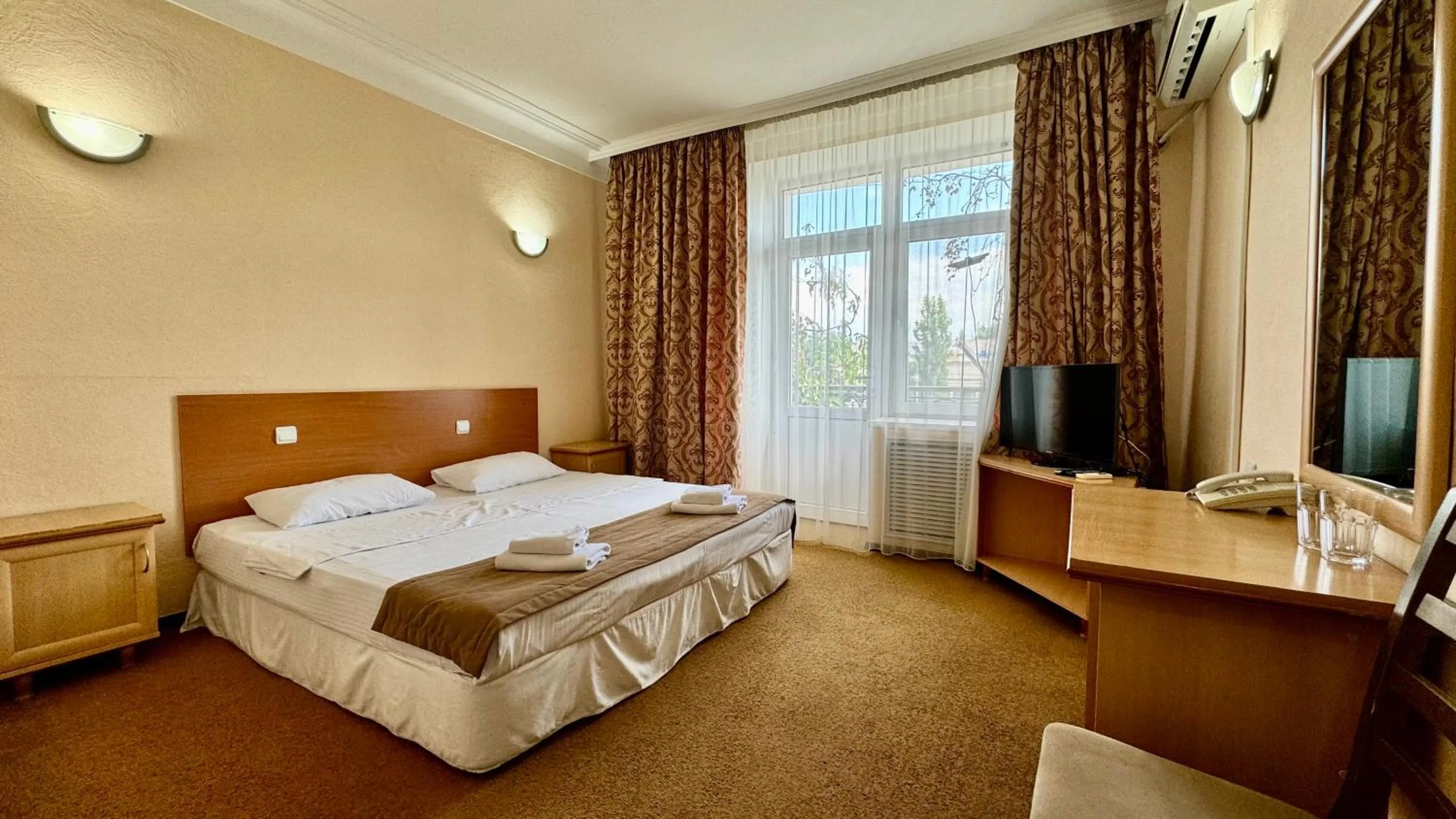 Bed in Hotel Zhambyl