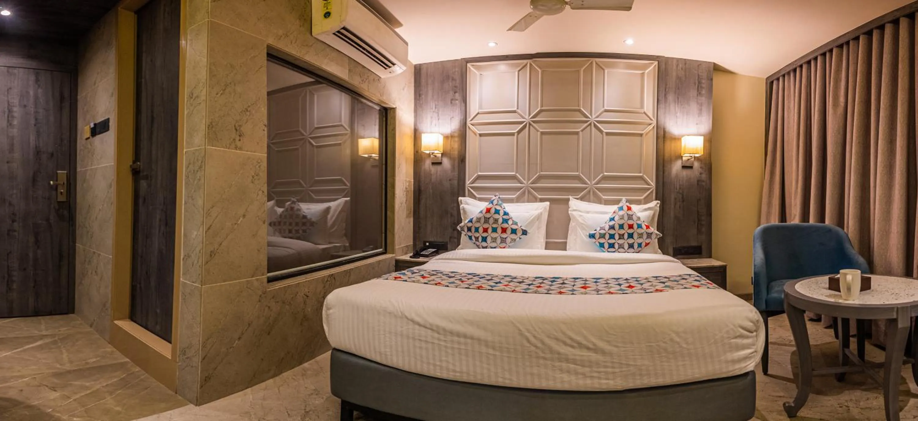 Photo of the whole room, Bed in Suvidha Suites