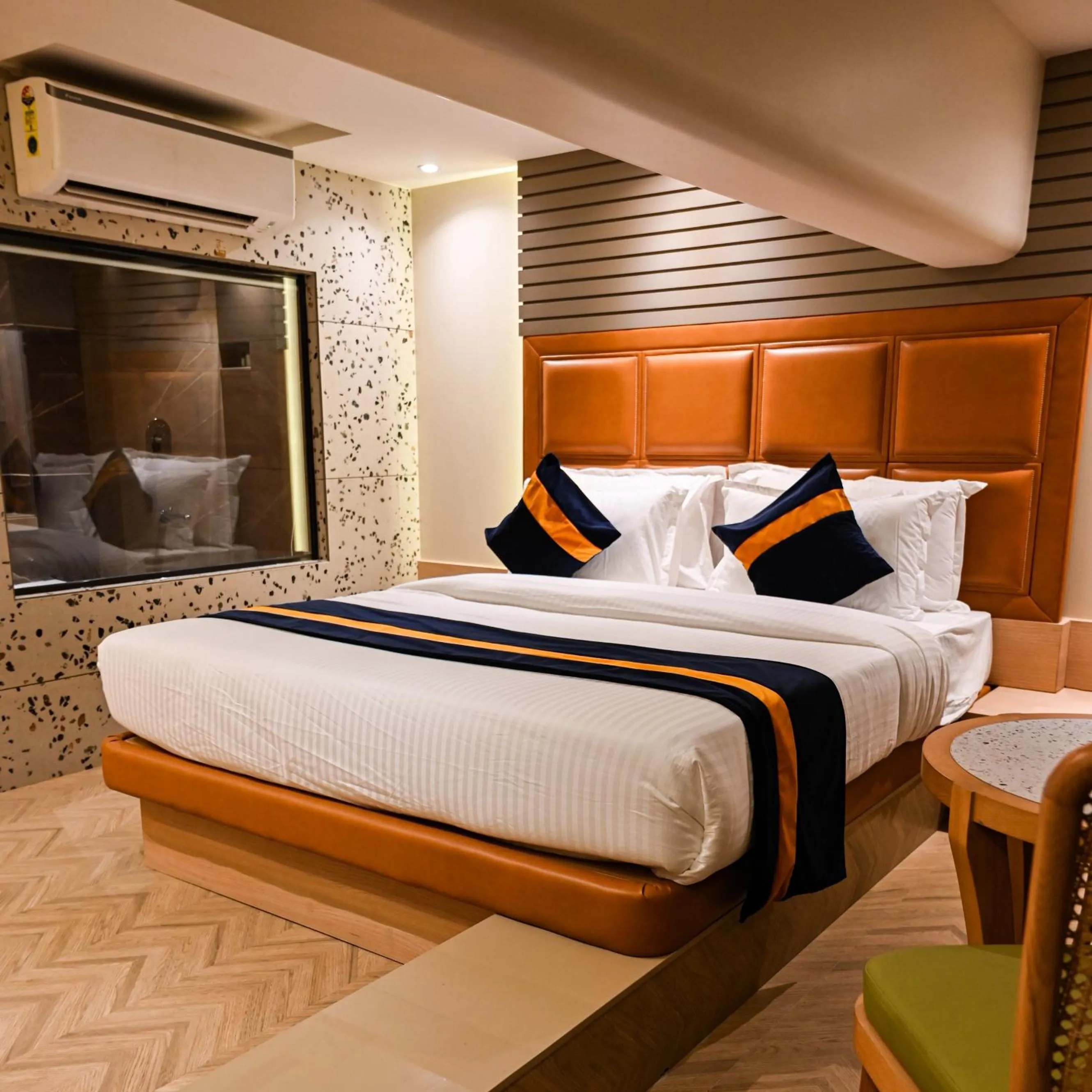 Bed in Suvidha Suites