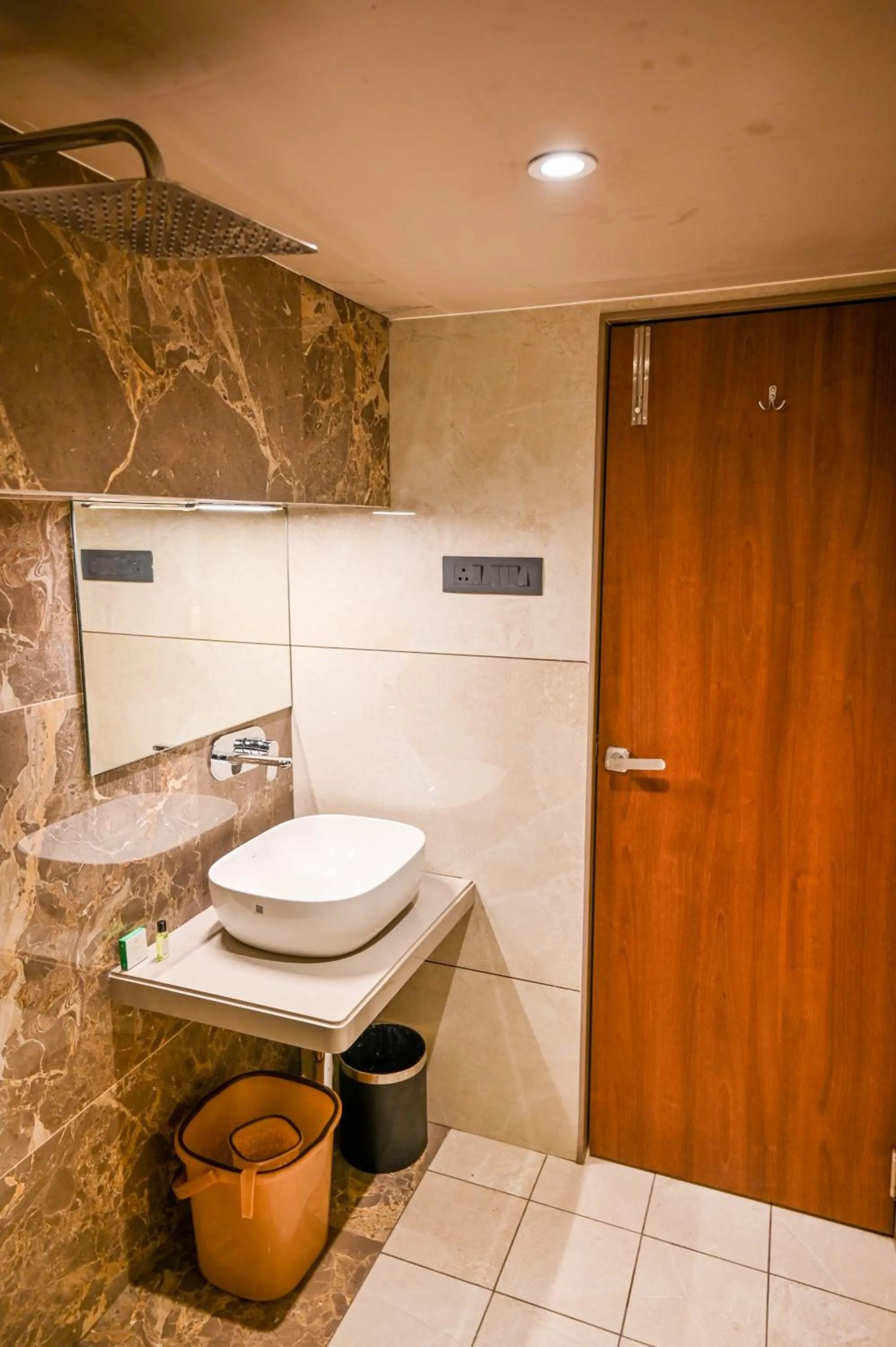 Bathroom in Suvidha Suites