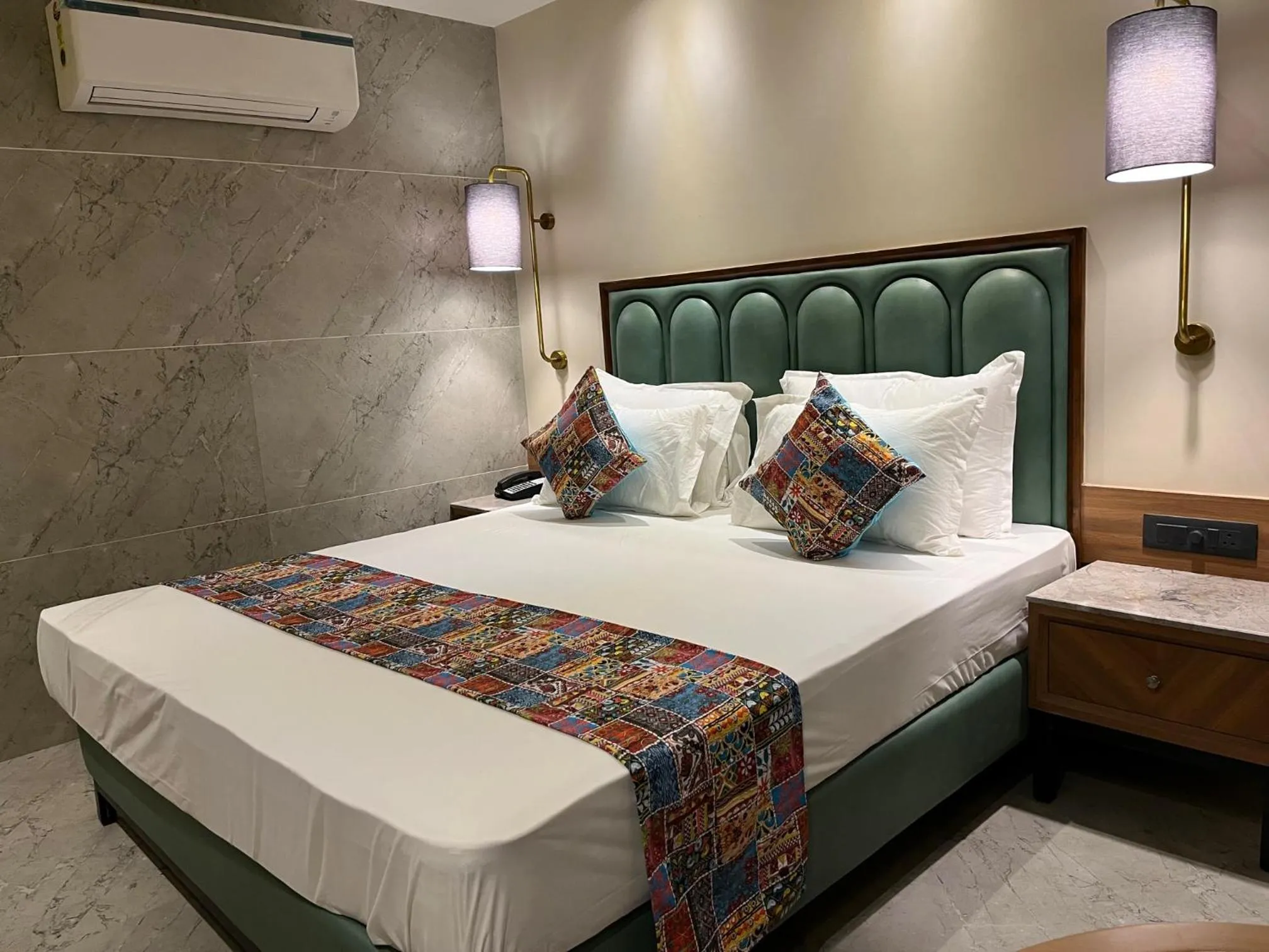 Bedroom, Bed in Suvidha Suites