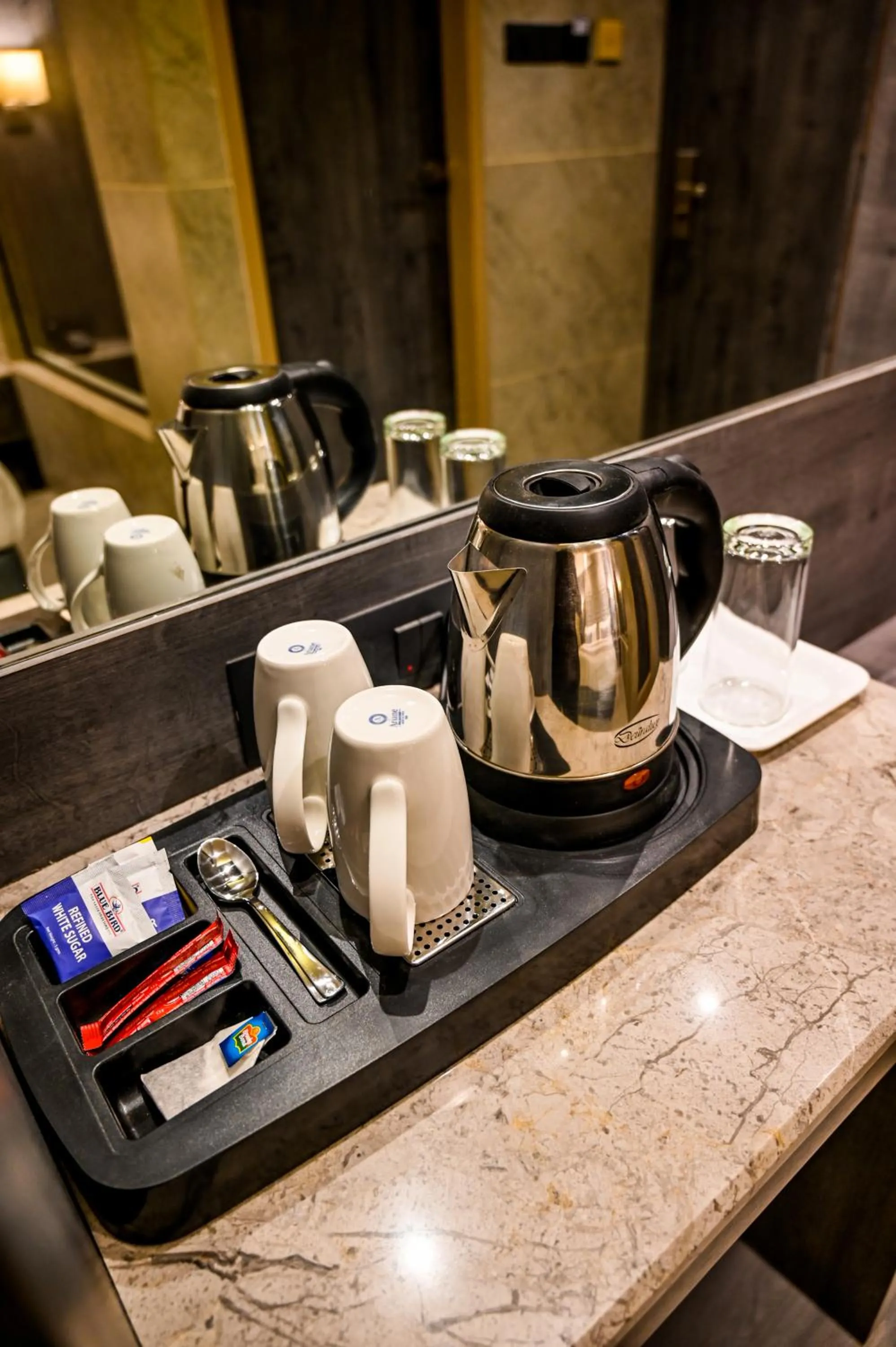 Coffee/tea facilities in Suvidha Suites