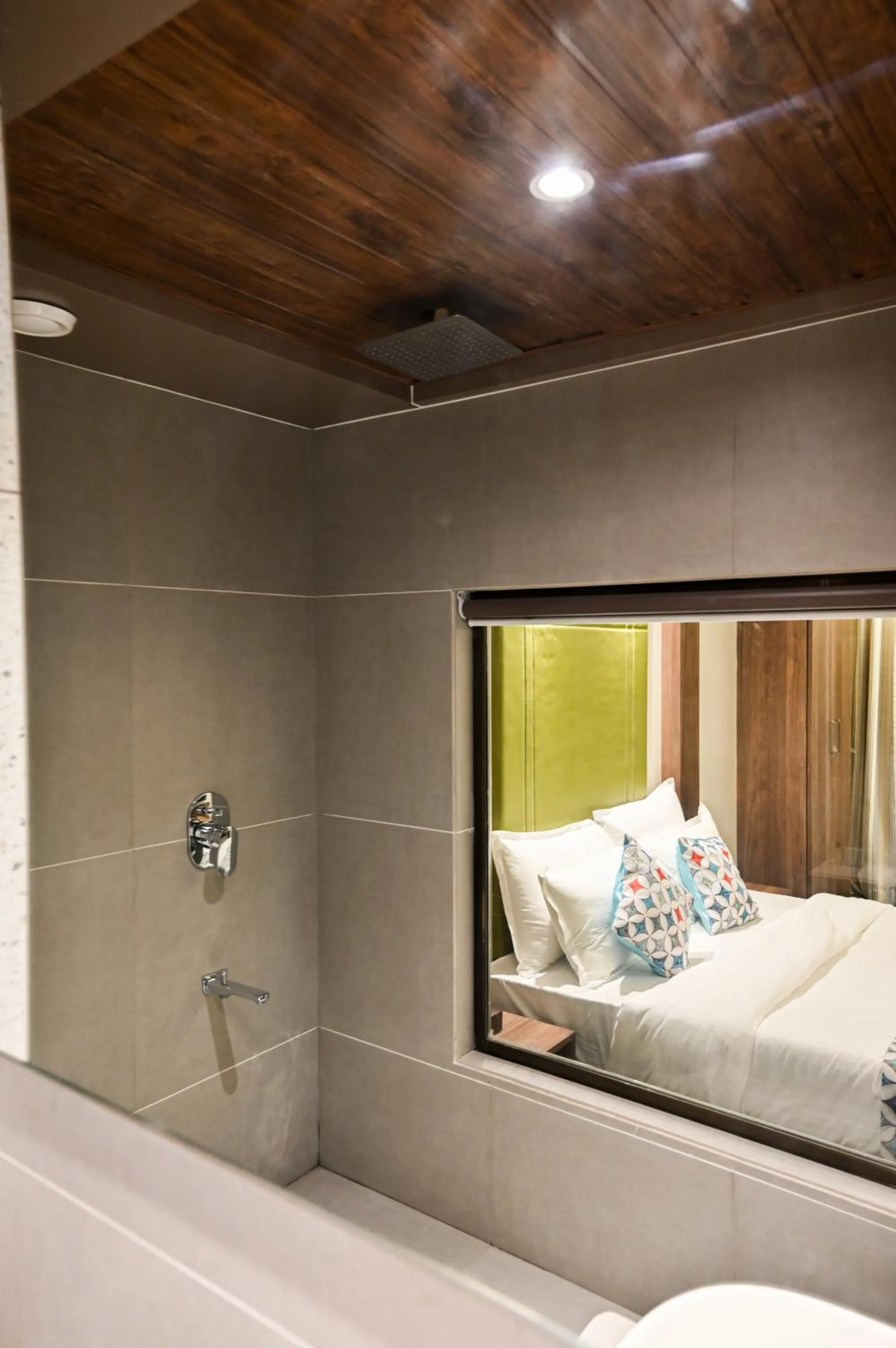 Bathroom, Bed in Suvidha Suites
