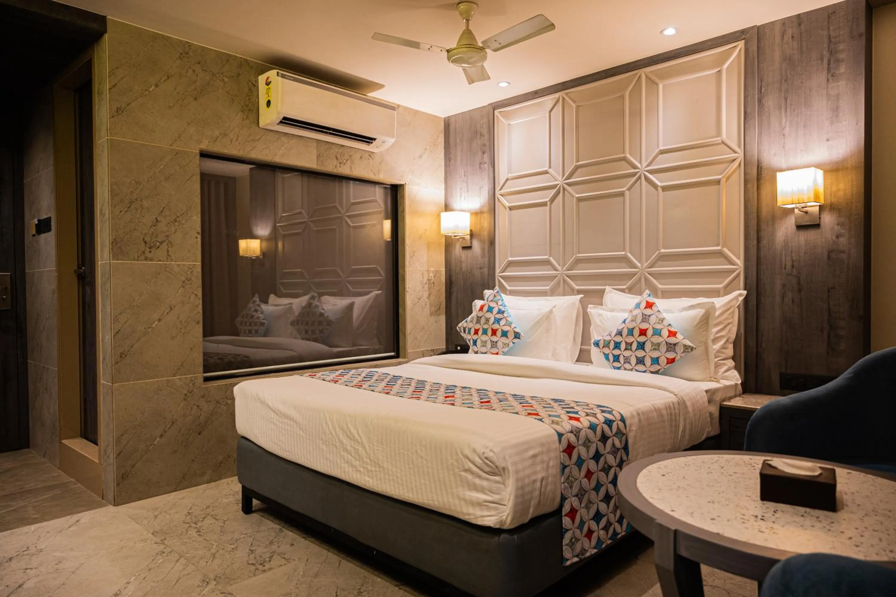 Photo of the whole room, Bed in Suvidha Suites