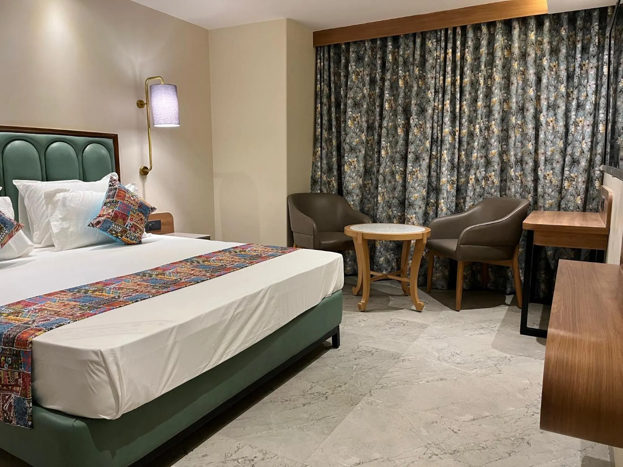 Photo of the whole room, Bed in Suvidha Suites