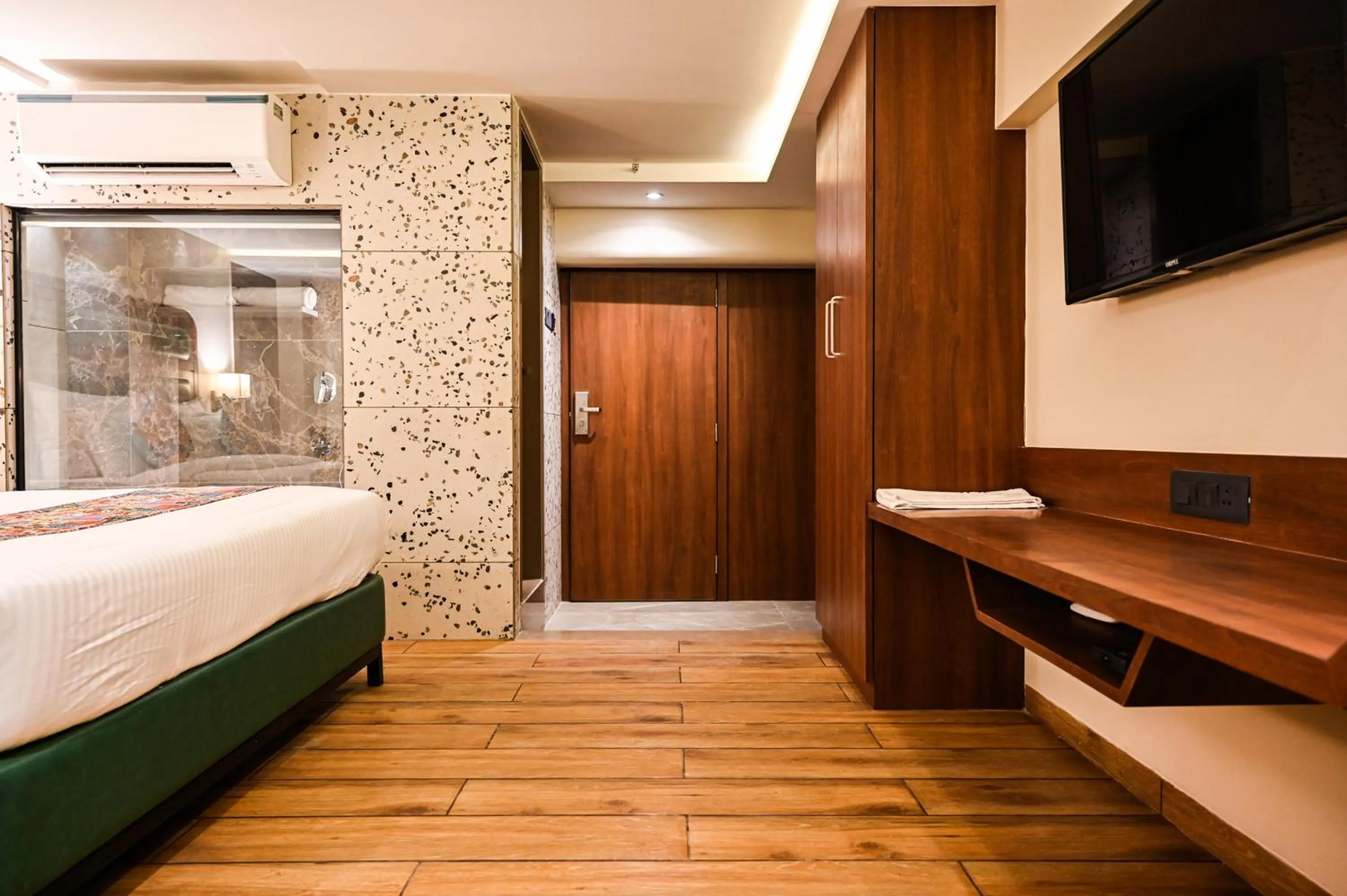 Photo of the whole room, Bed in Suvidha Suites