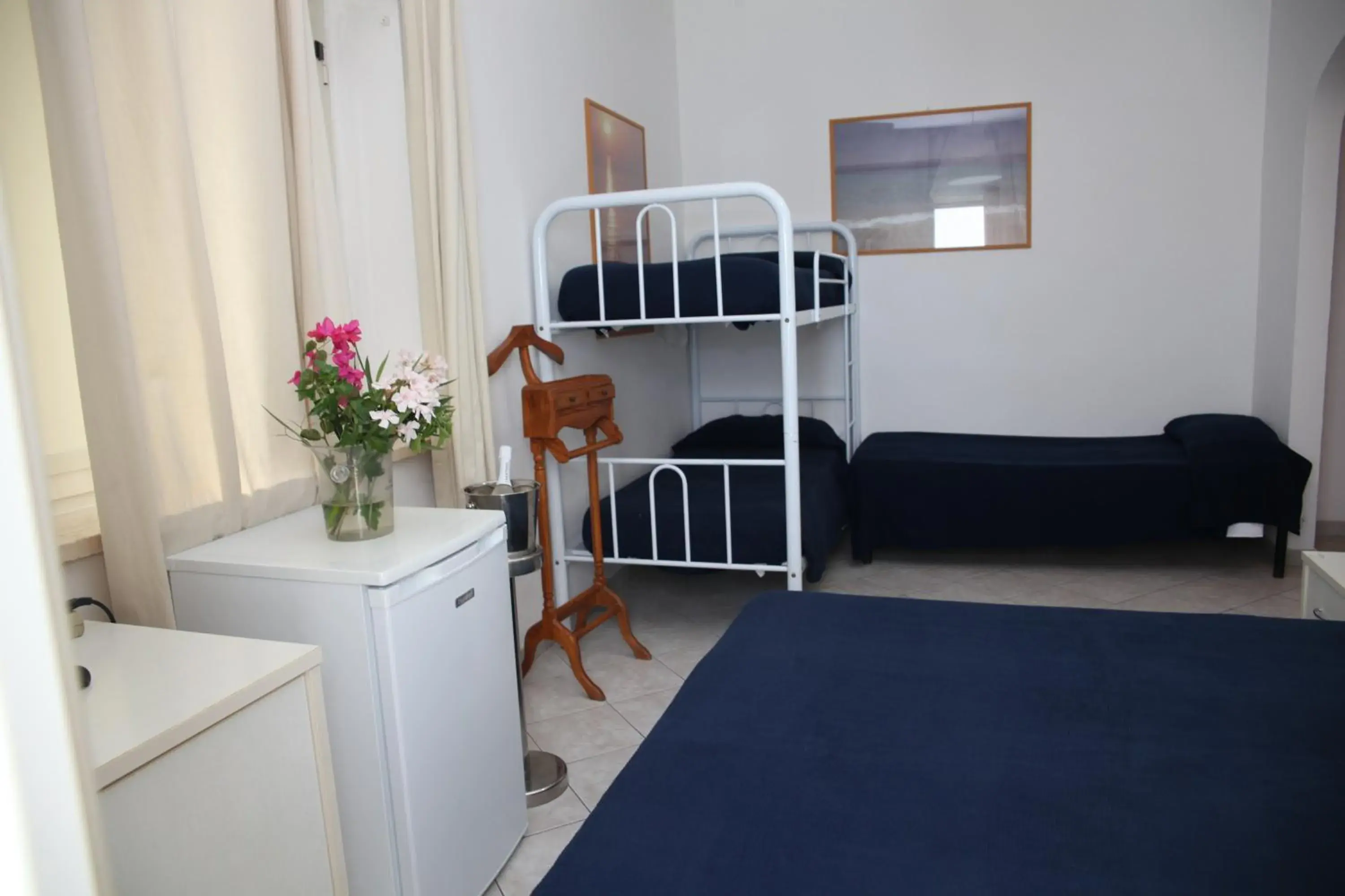 Quadruple Room in Hotel Piccolo Mondo Quadruple Room in Hotel Piccolo Mondo