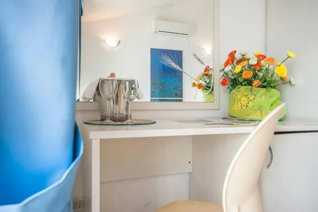 Bed in Hotel Piccolo Mondo