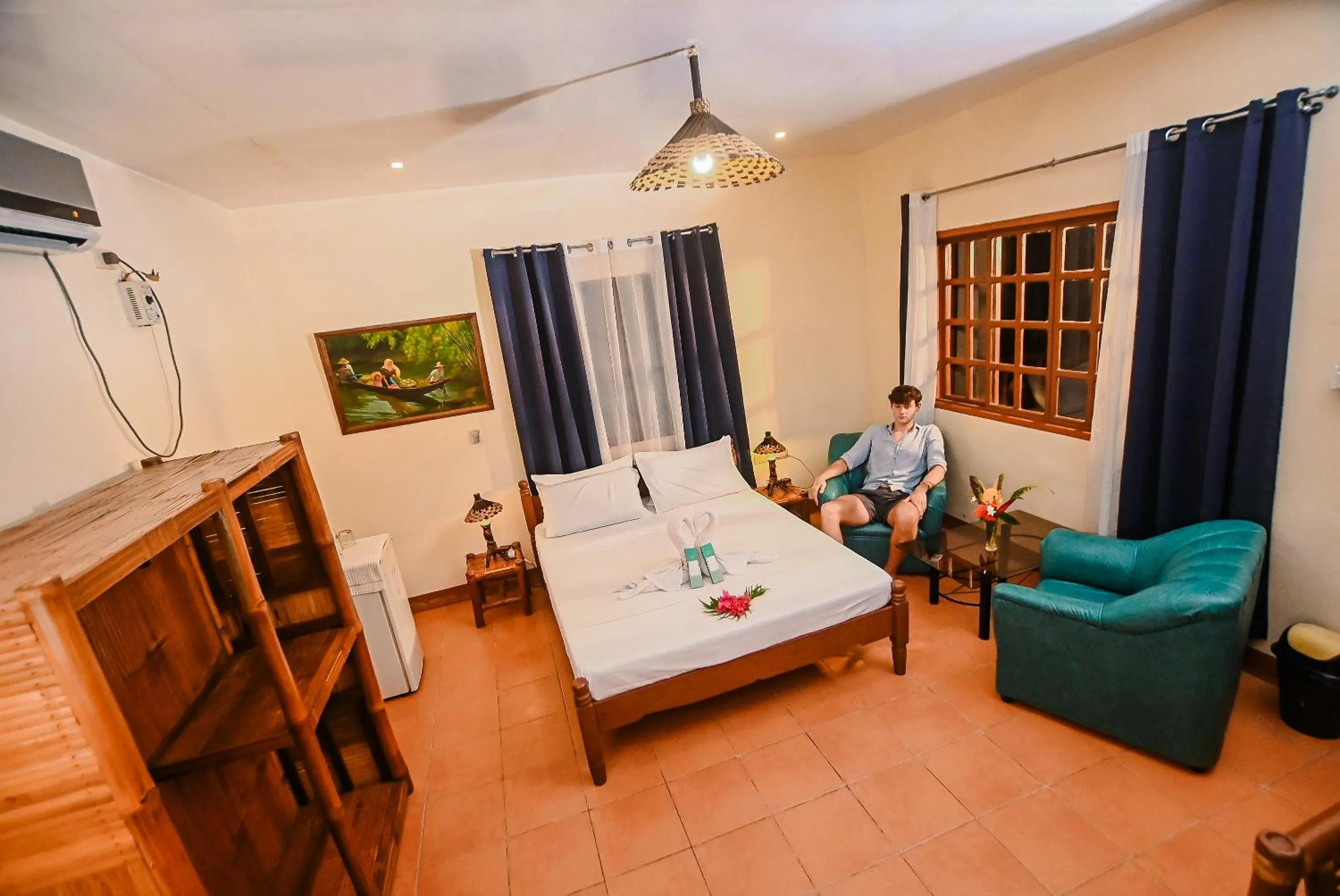 Photo of the whole room, Bed in Garden of Eden Dive Resort