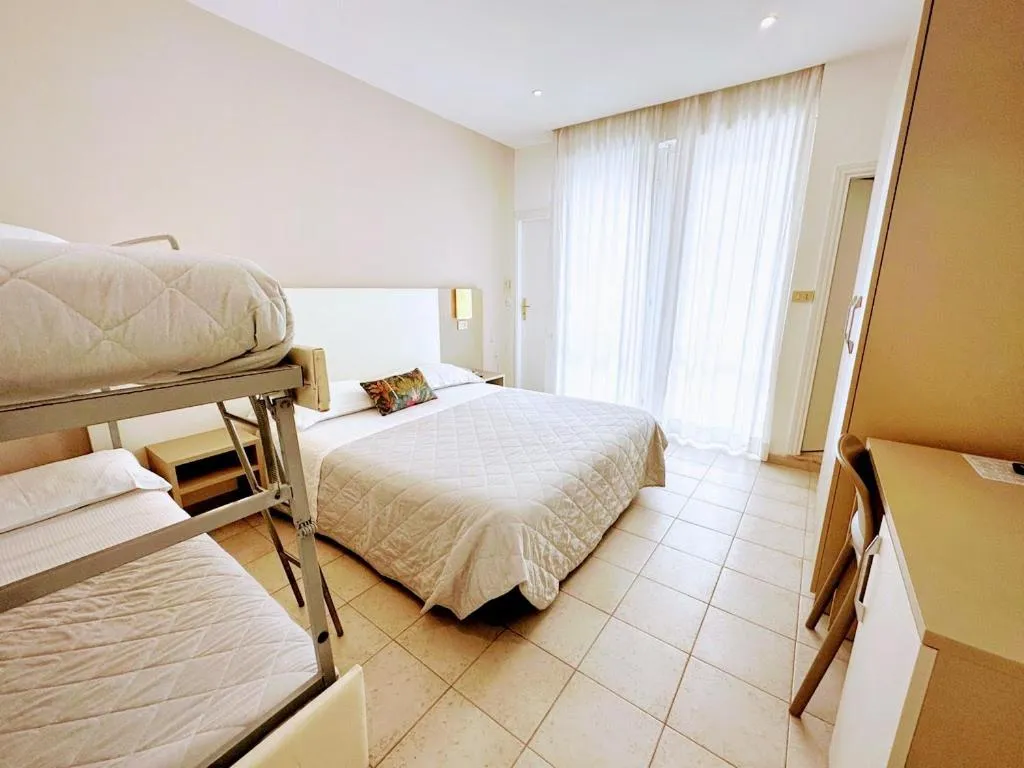 Photo of the whole room, Bed in Aura Living Hotel