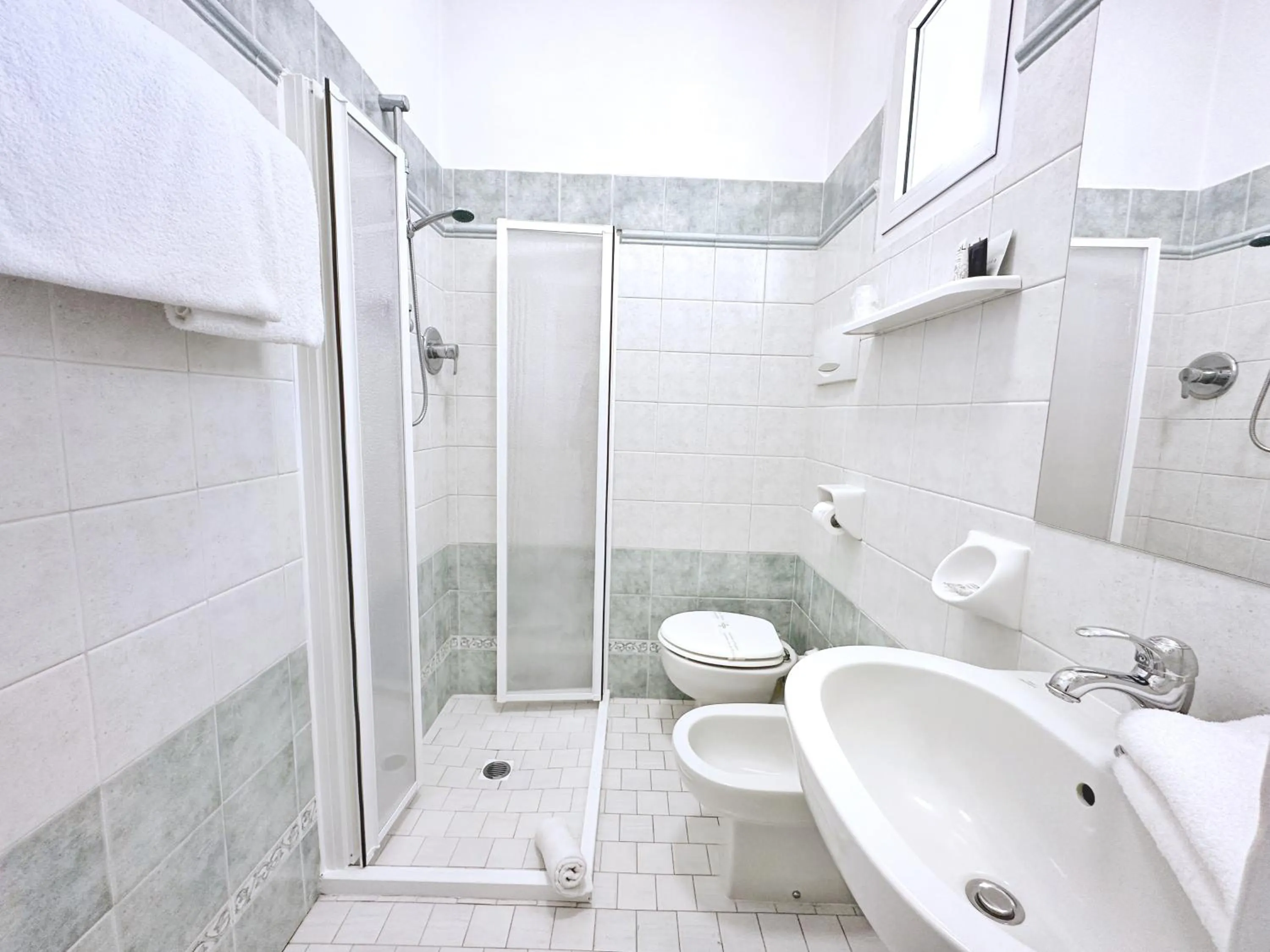 Toilet in Aura Living Hotel