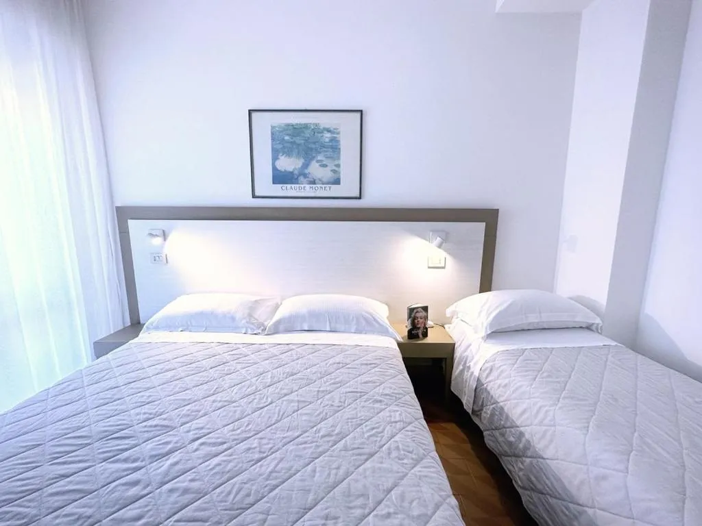 Photo of the whole room, Bed in Aura Living Hotel