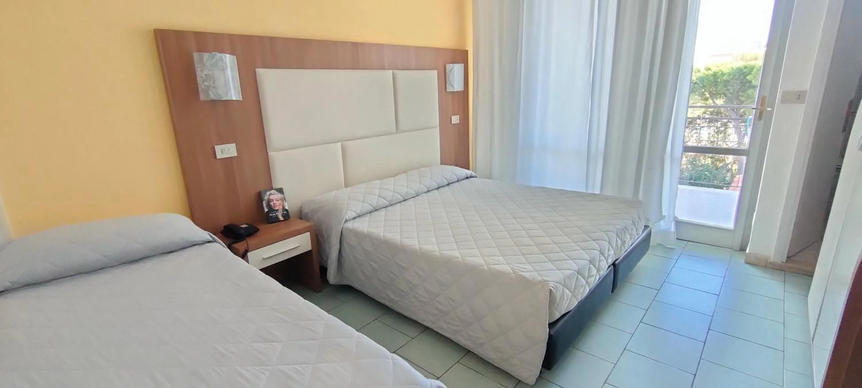 Photo of the whole room, Bed in Aura Living Hotel