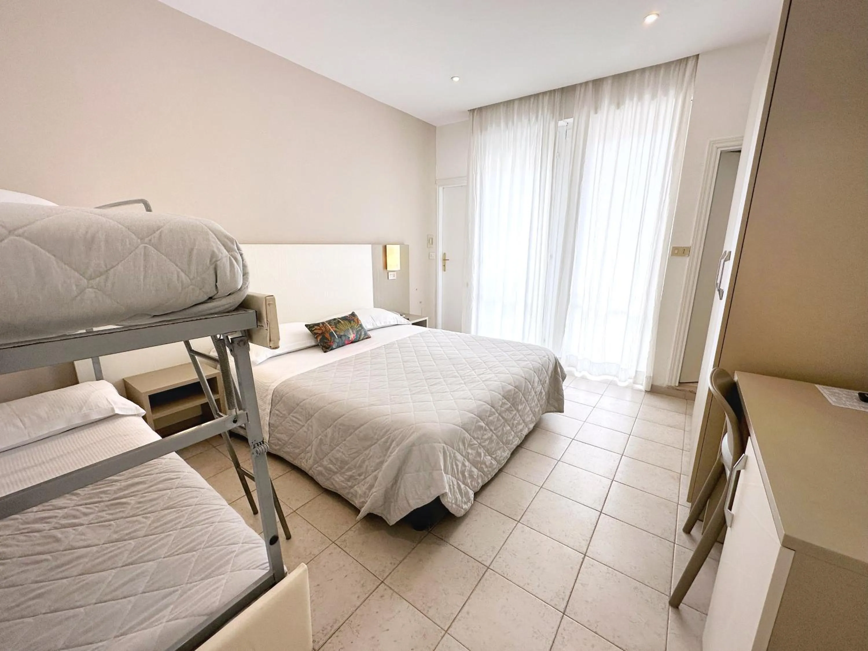 Photo of the whole room, Bed in Aura Living Hotel