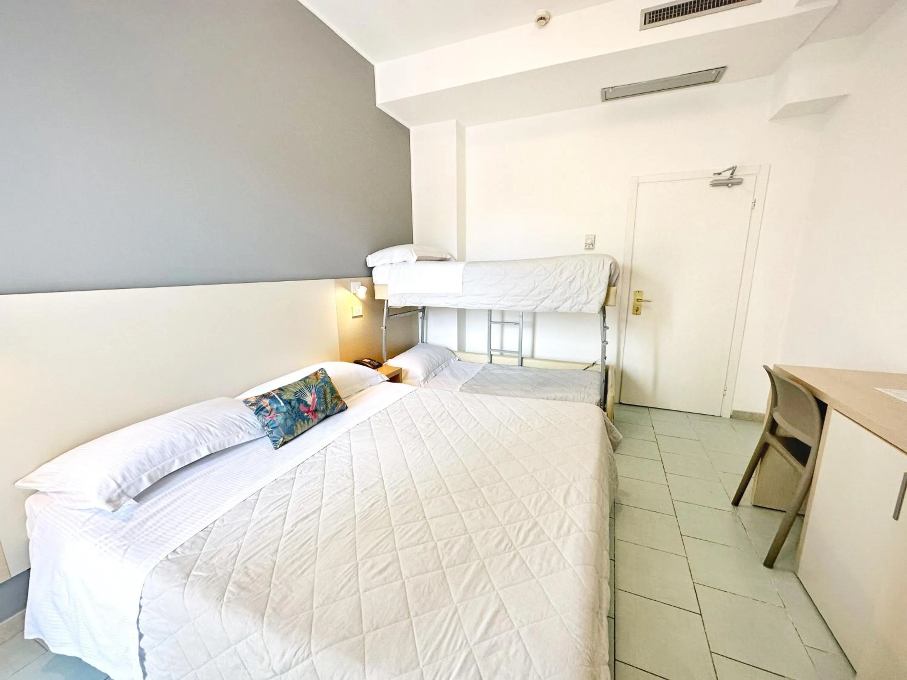 Bed in Aura Living Hotel