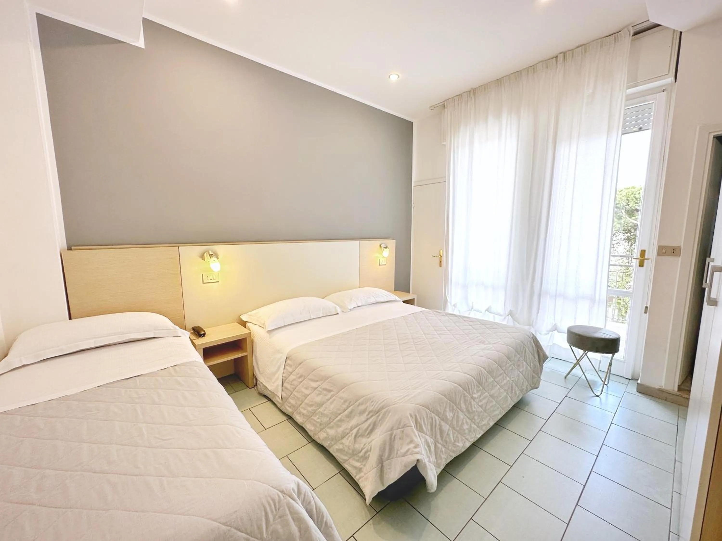 Photo of the whole room, Bed in Aura Living Hotel