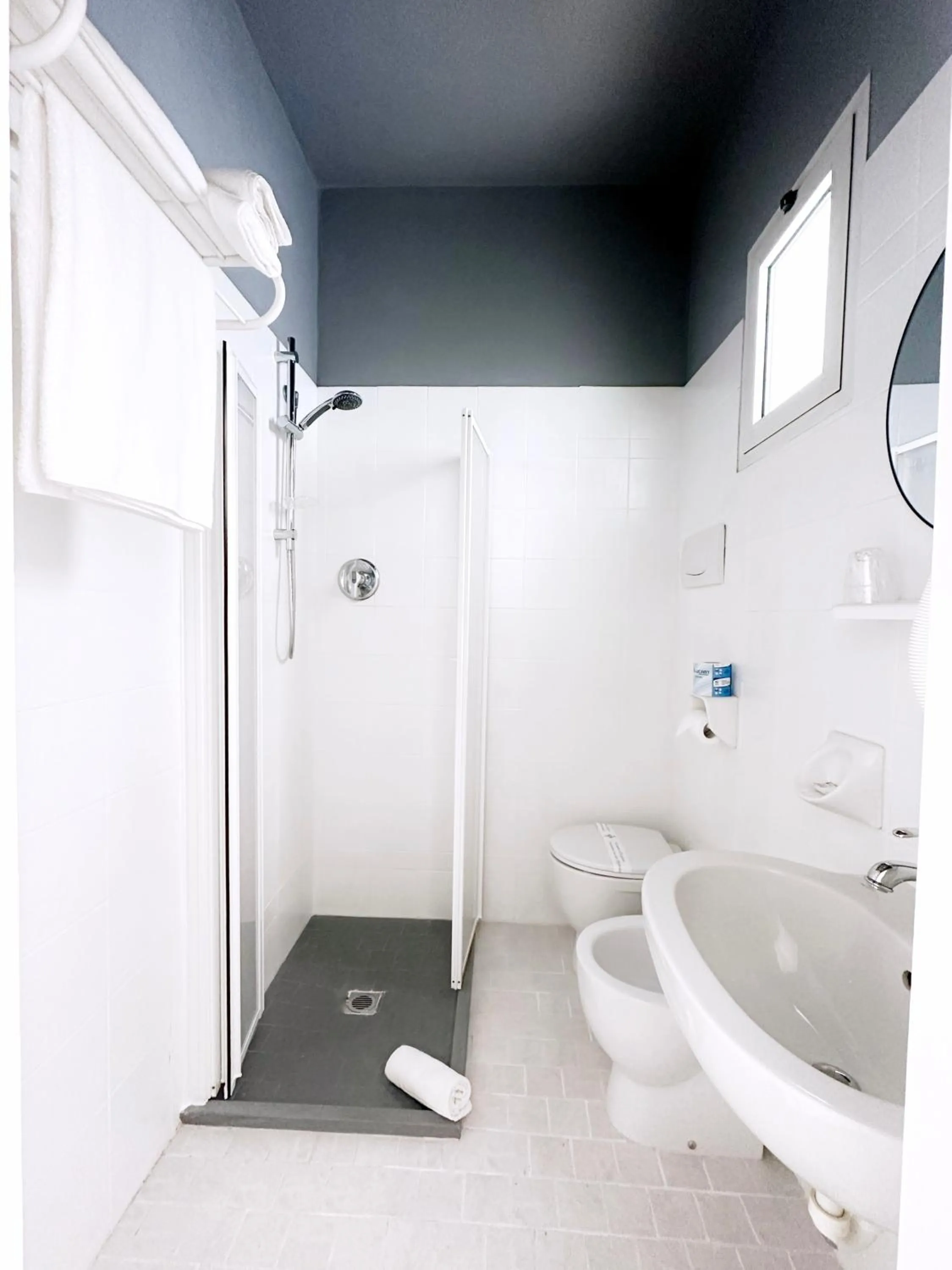 Shower in Aura Living Hotel