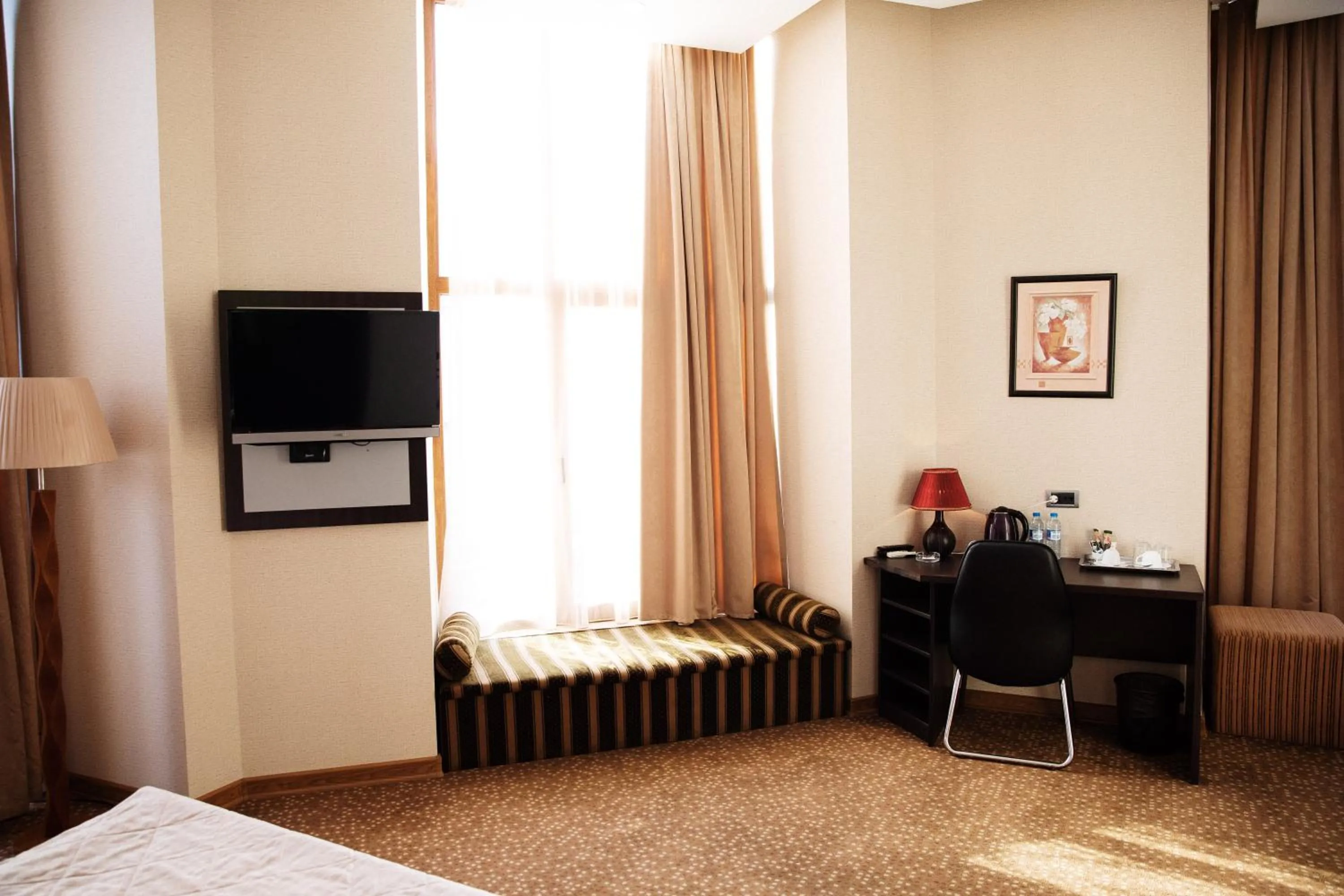 Seating area, Bed in Austin Hotel Baku