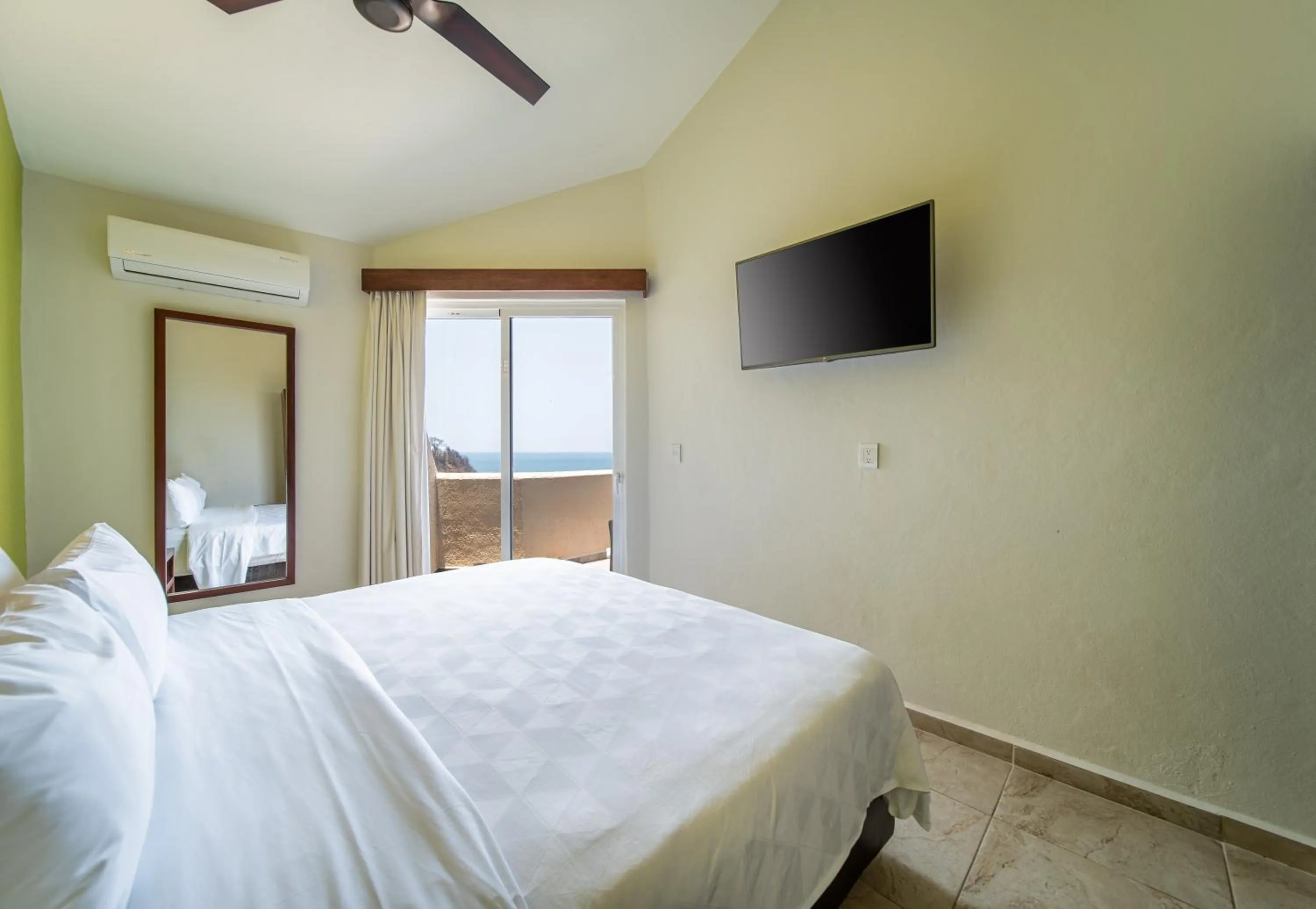 Bed in Villas Coral Huatulco