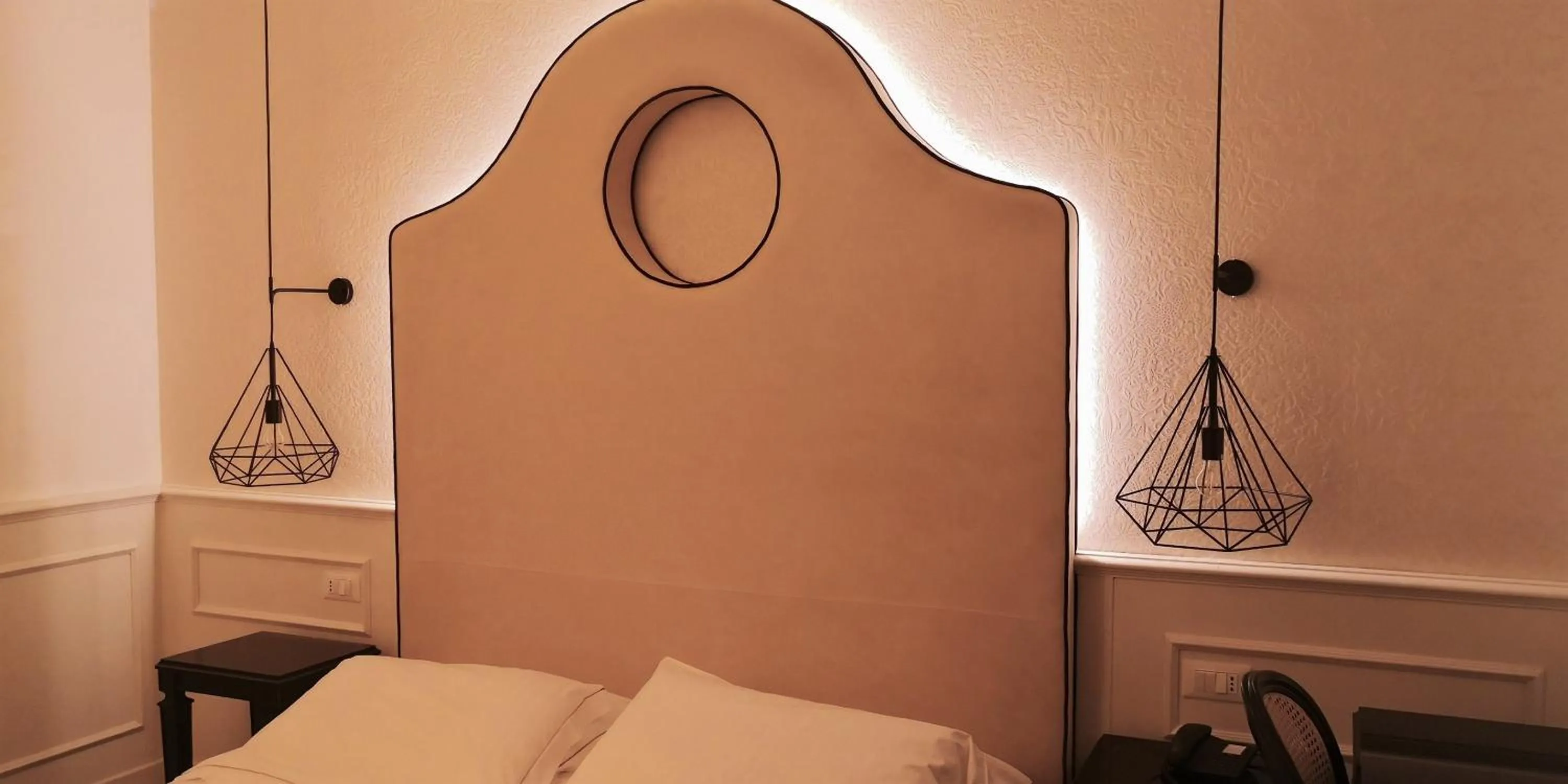 Decorative detail, Bed in Hotel San Luca