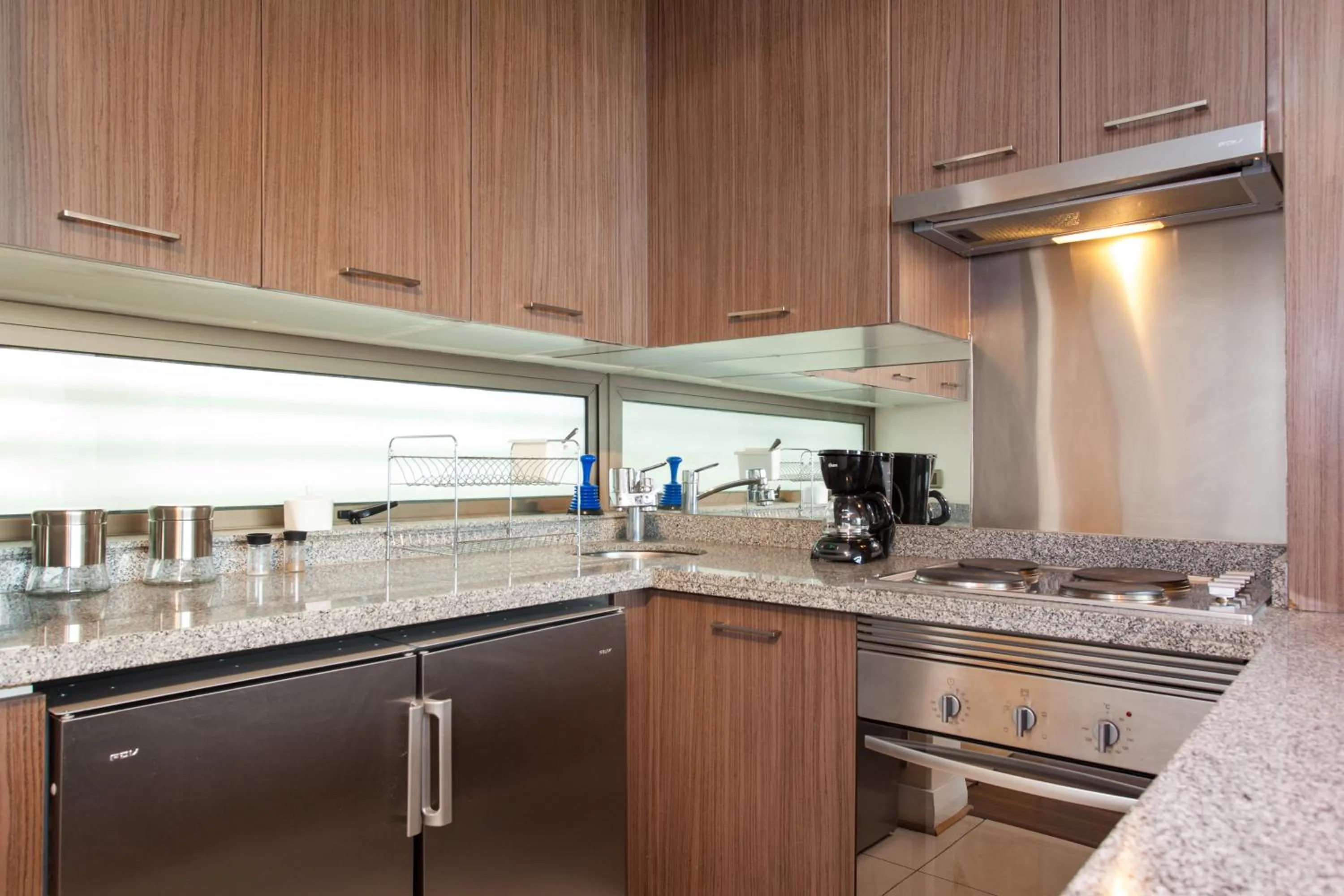 Kitchen or kitchenette in myLUXAPART Las Condes