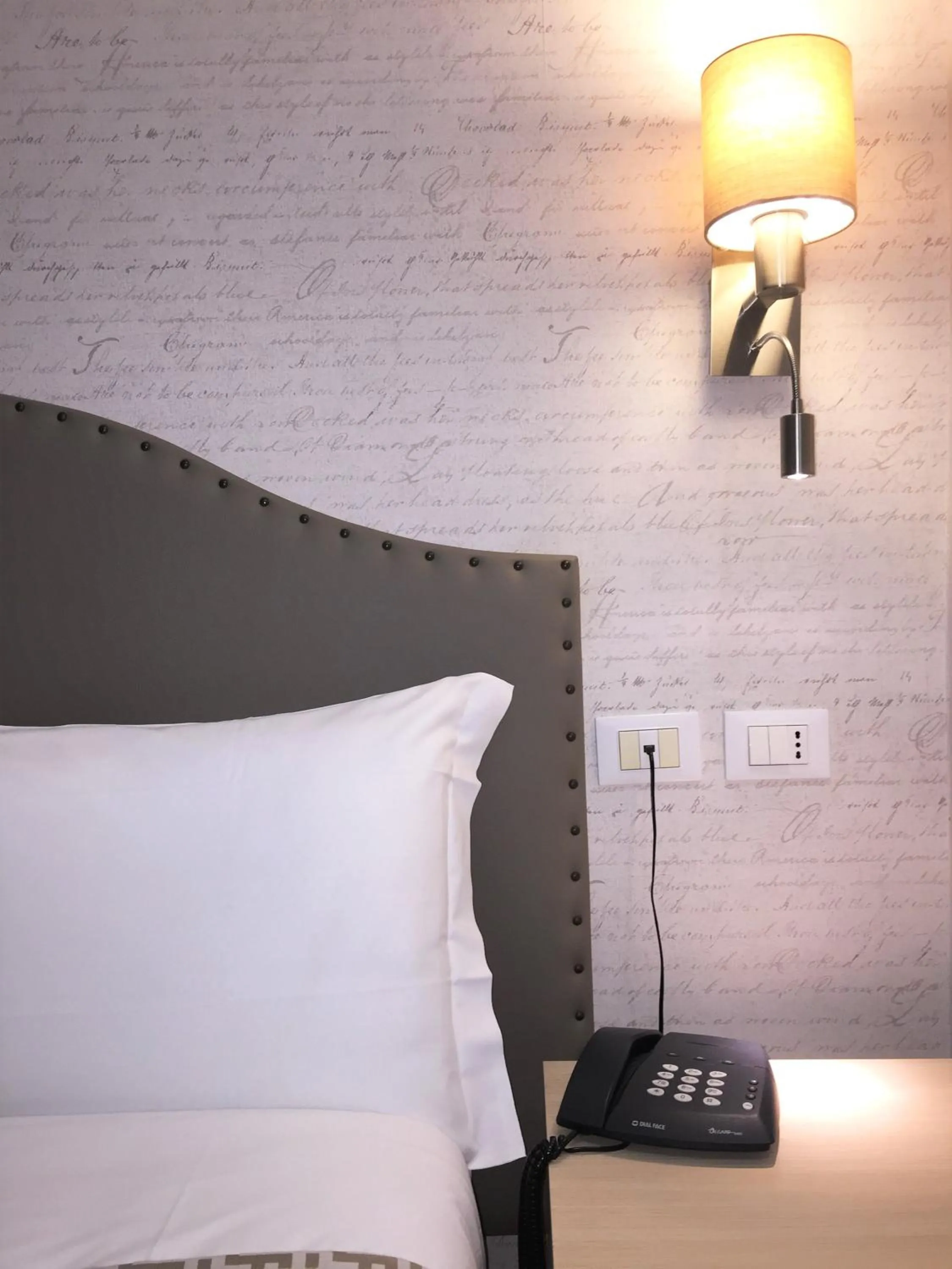 Decorative detail, Bed in Hotel Lo Scudiero