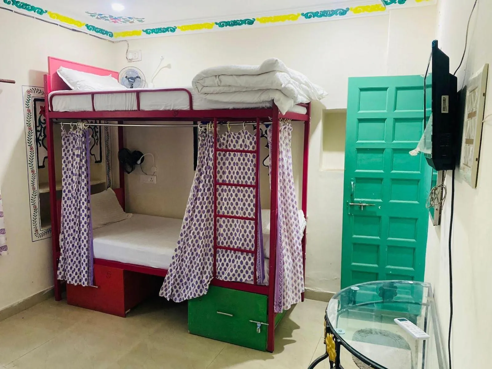 Photo of the whole room, Bed in HOTEL HANUMAN GHAT On LAKE PICHOLA