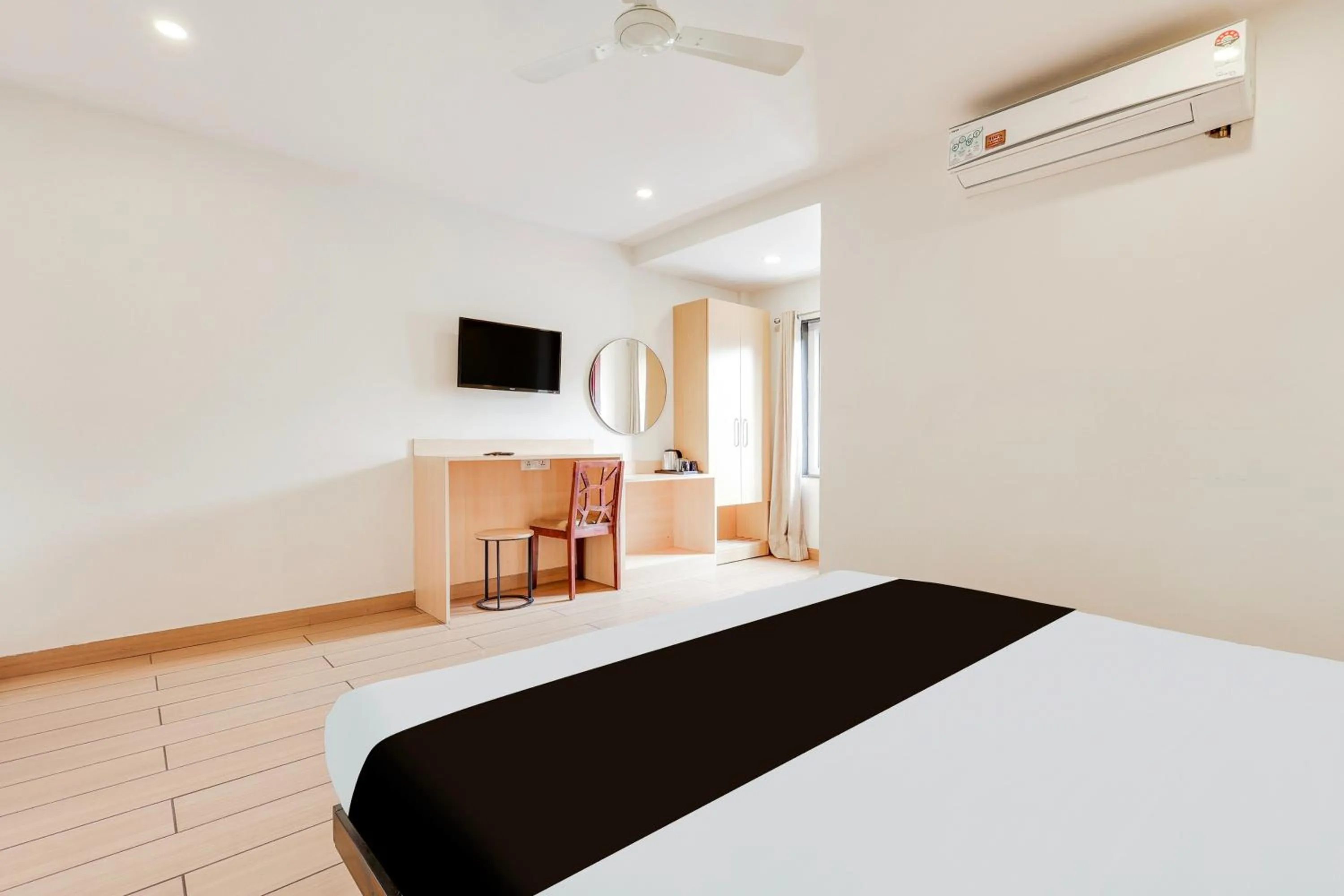 Bedroom, Bed in Super Townhouse Visakhapatnam