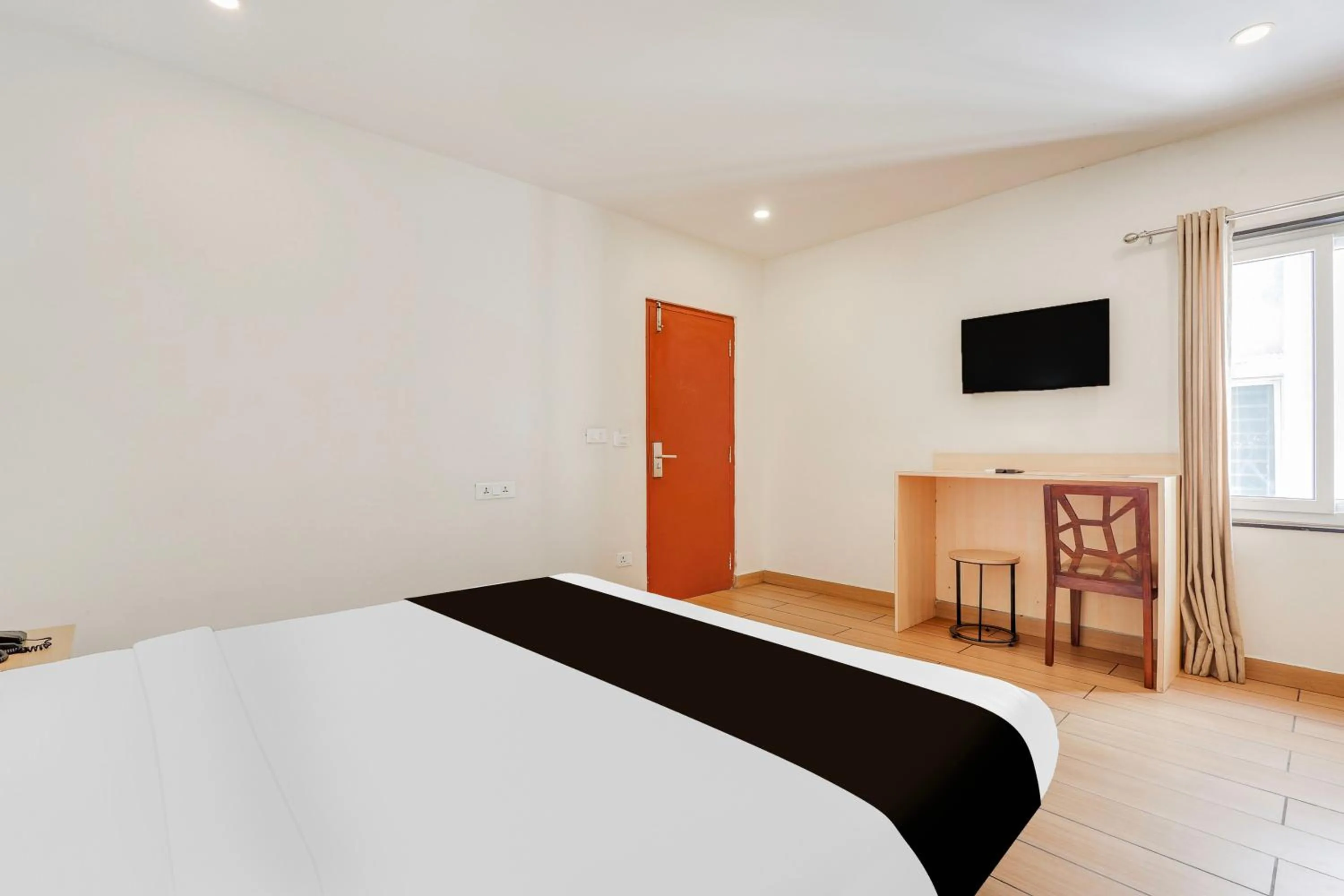 Bedroom, Bed in Super Townhouse Visakhapatnam