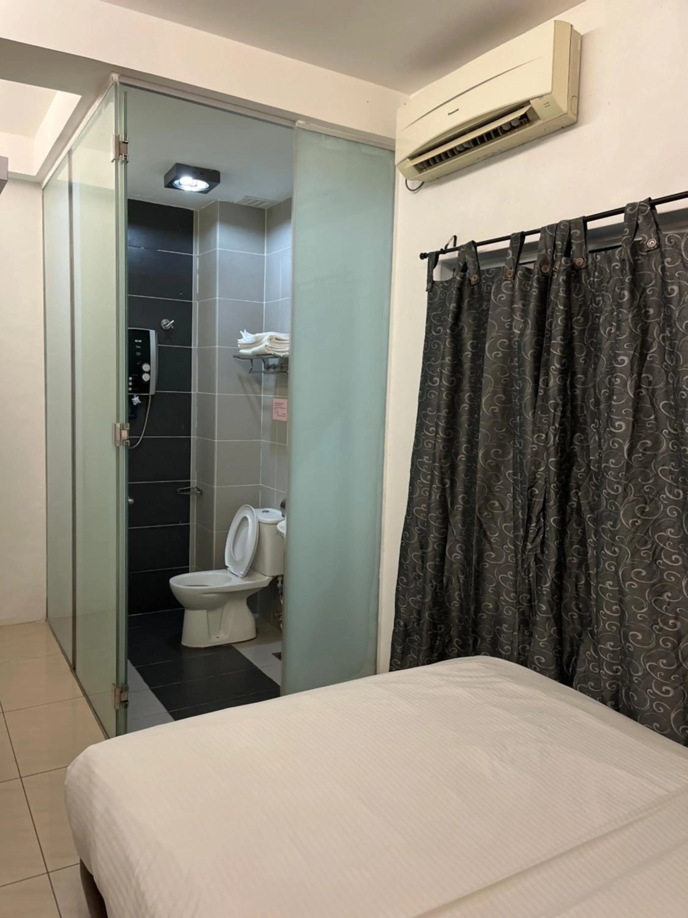 Bed in Coastline Hotel